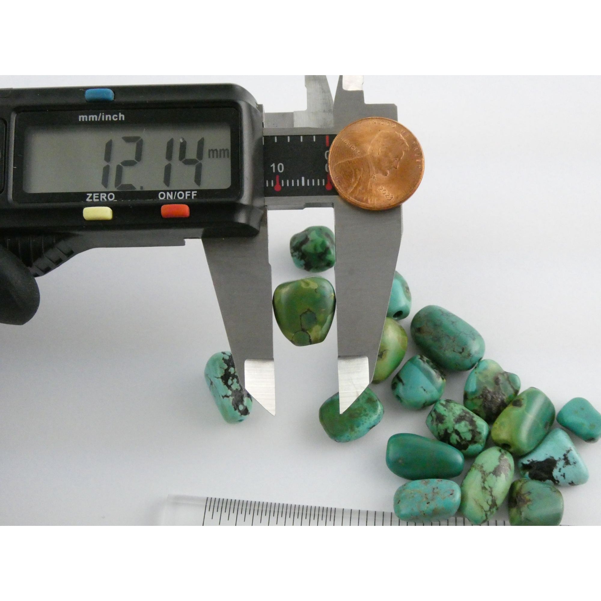 Group of 17 Loose Turquoise Drilled Beads Total Weight 23.3g Varied Sizes