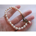 Luxe Sterling Silver Ringed Pinkish Pearl Breast Cancer Awareness Bracelet 8 In