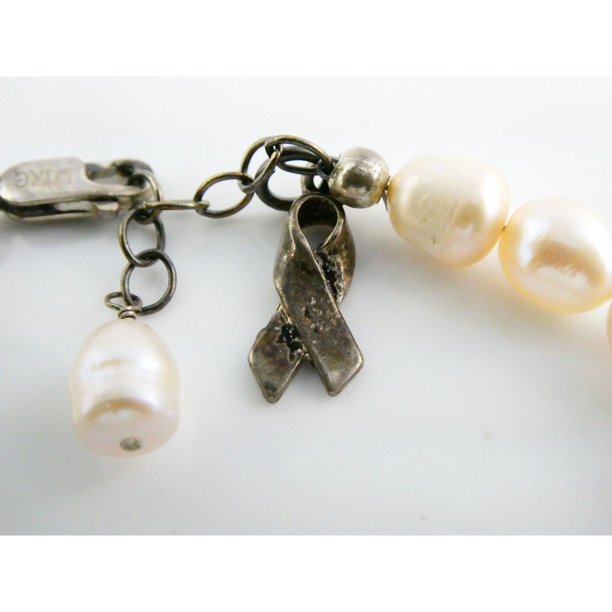 Luxe Sterling Silver Ringed Pinkish Pearl Breast Cancer Awareness Bracelet 8 In