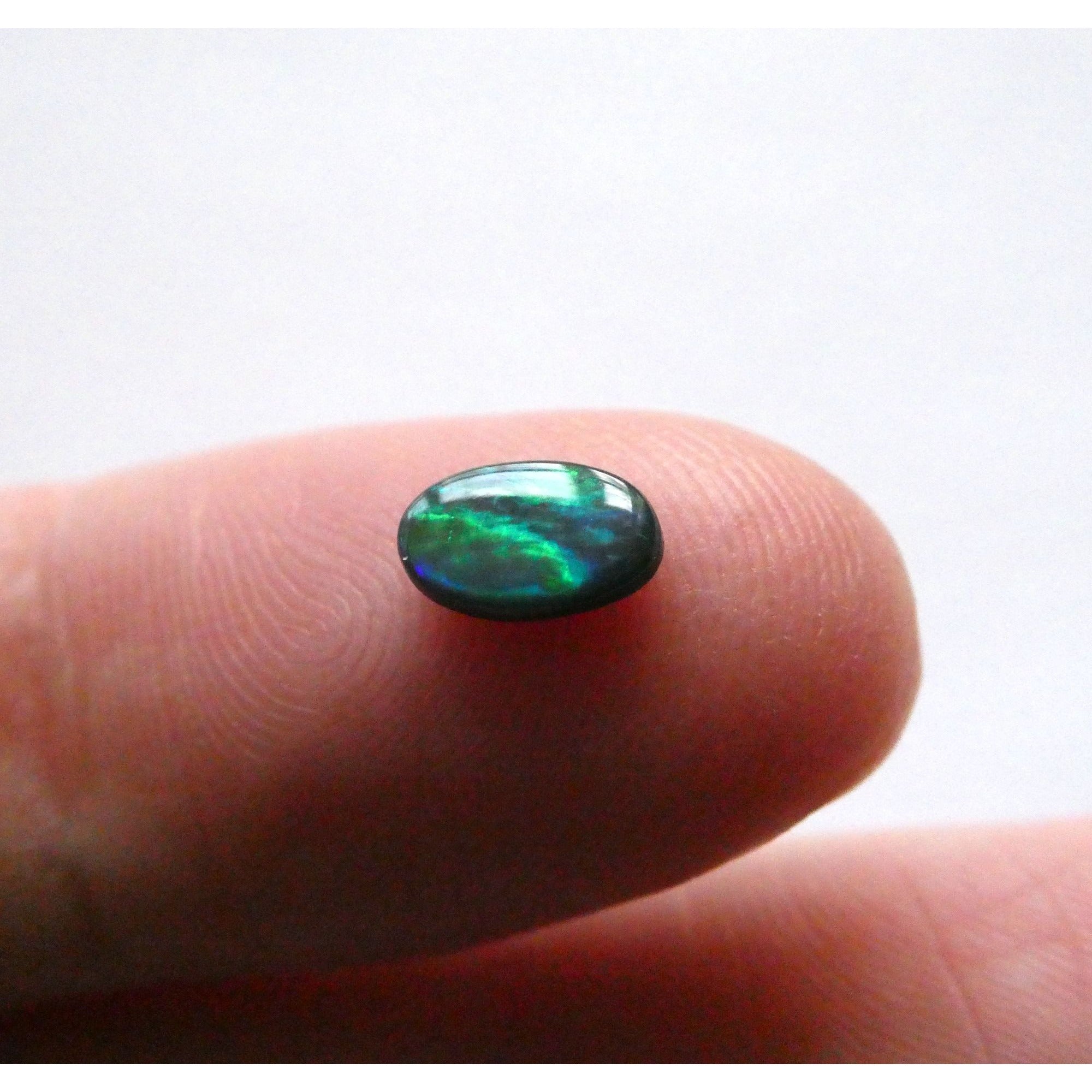 Australian Polished and Cut Freeform Opal Cabochon .42 CT Weight 7.11mm x 4.50mm