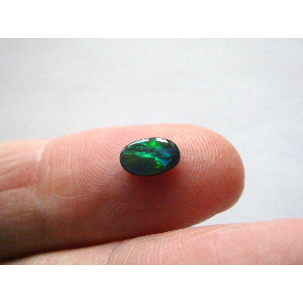 Australian Polished and Cut Freeform Opal Cabochon .42 CT Weight 7.11mm x 4.50mm