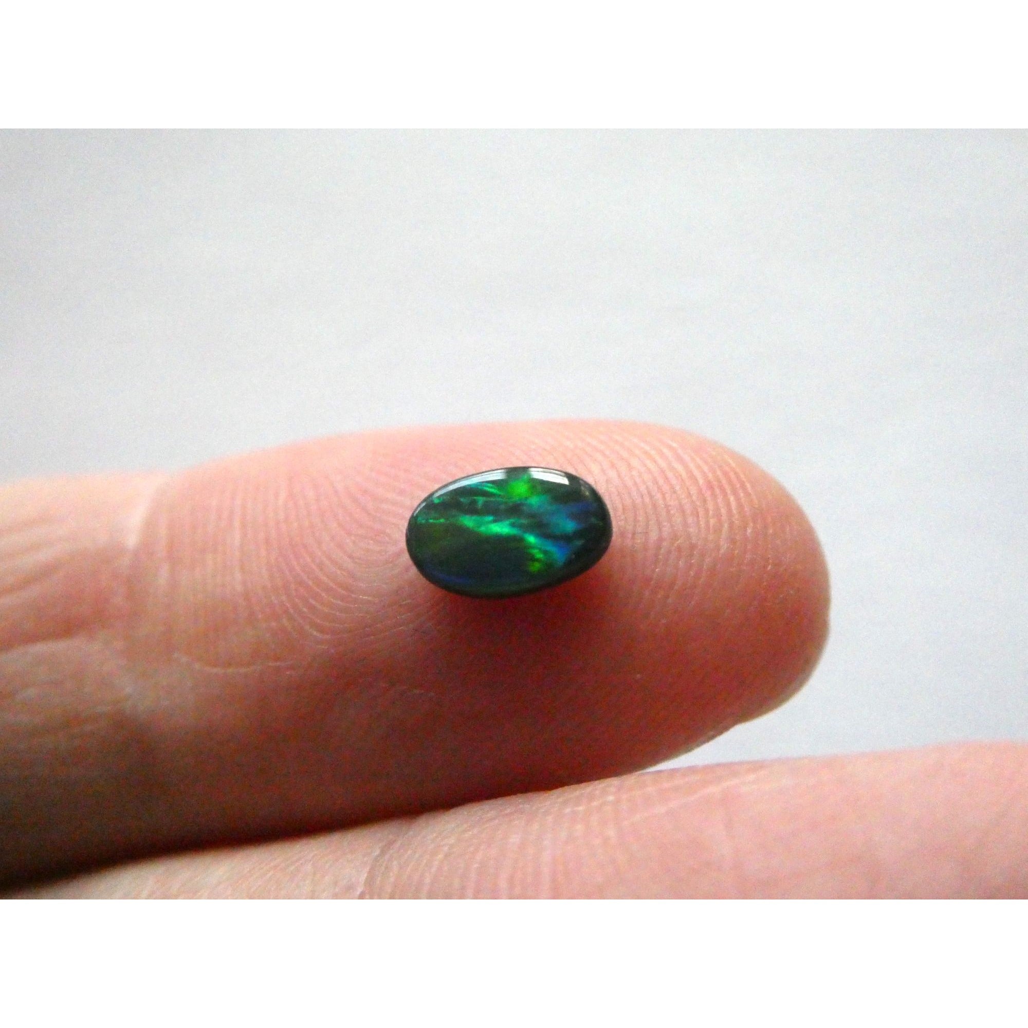 Australian Polished and Cut Freeform Opal Cabochon .42 CT Weight 7.11mm x 4.50mm