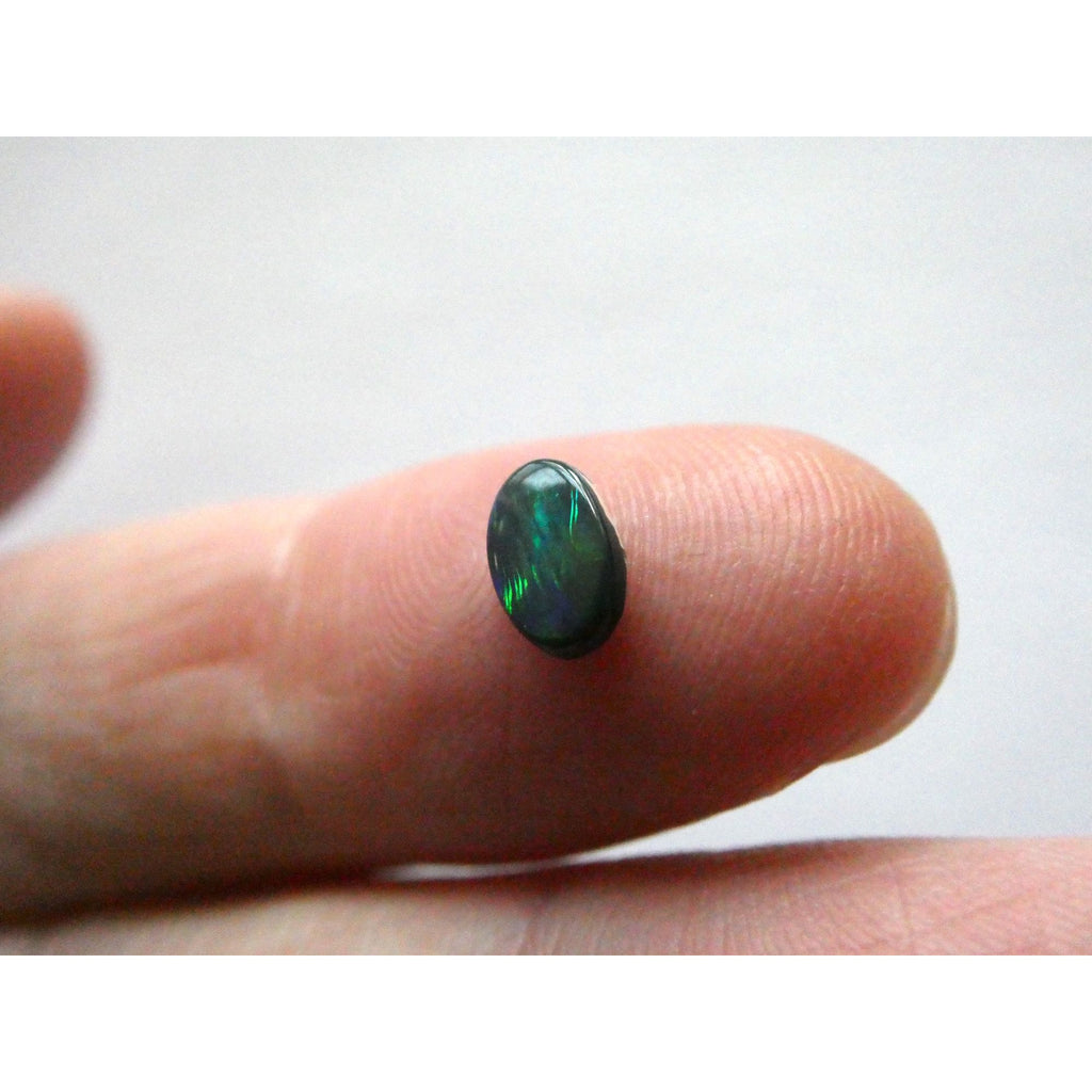 Australian Polished and Cut Freeform Opal Cabochon .42 CT Weight 7.11mm x 4.50mm