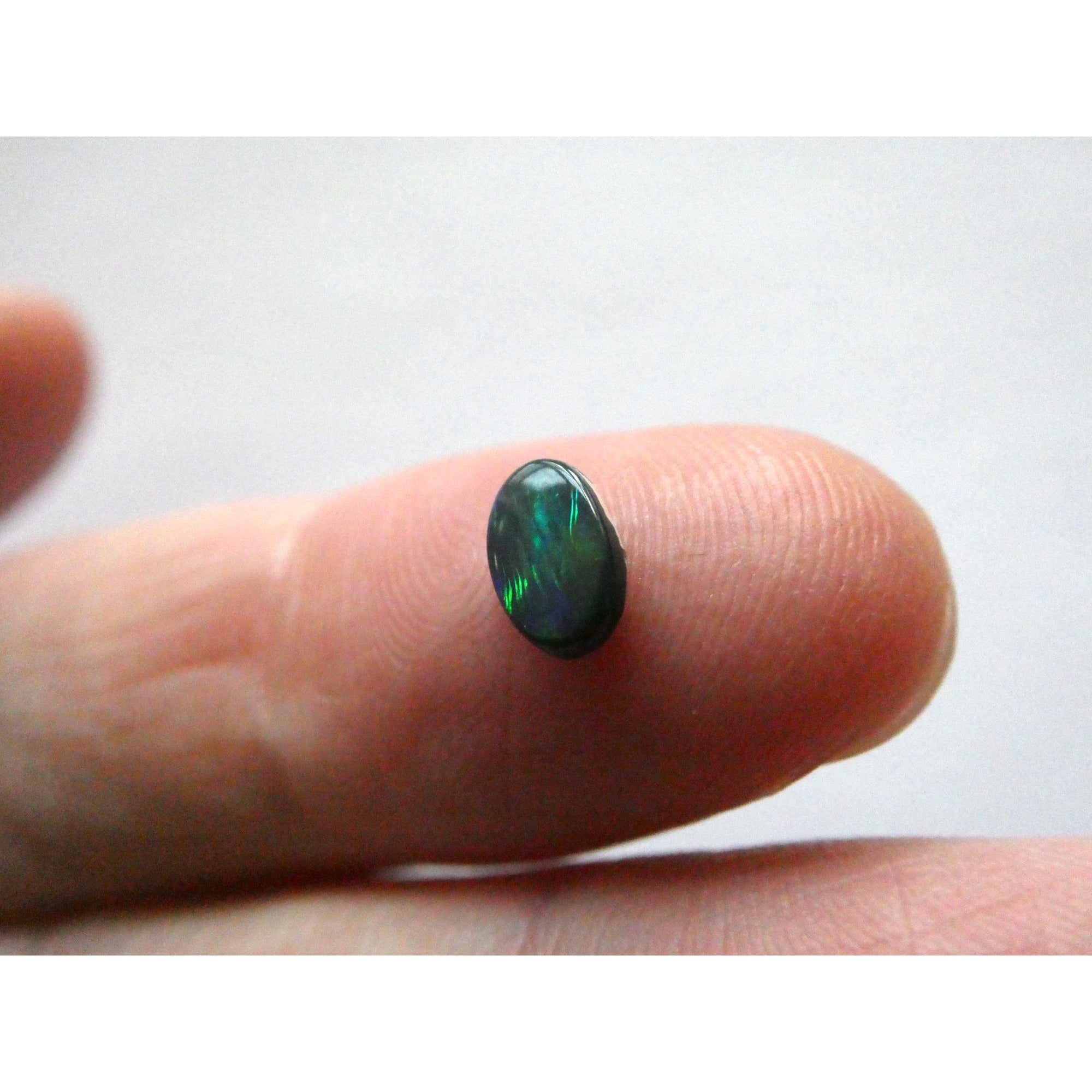 Australian Polished and Cut Freeform Opal Cabochon .42 CT Weight 7.11mm x 4.50mm