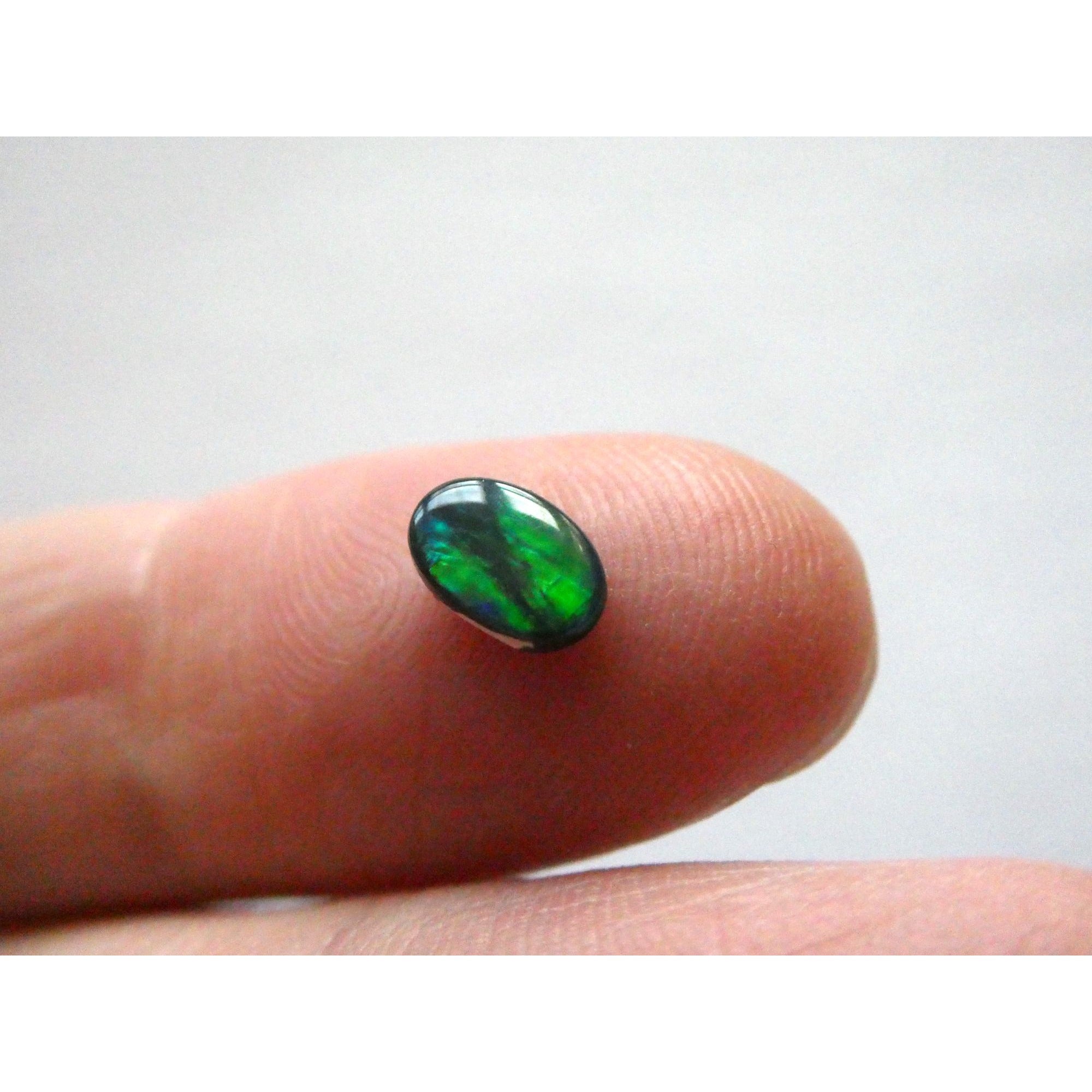 Australian Polished and Cut Freeform Opal Cabochon .42 CT Weight 7.11mm x 4.50mm