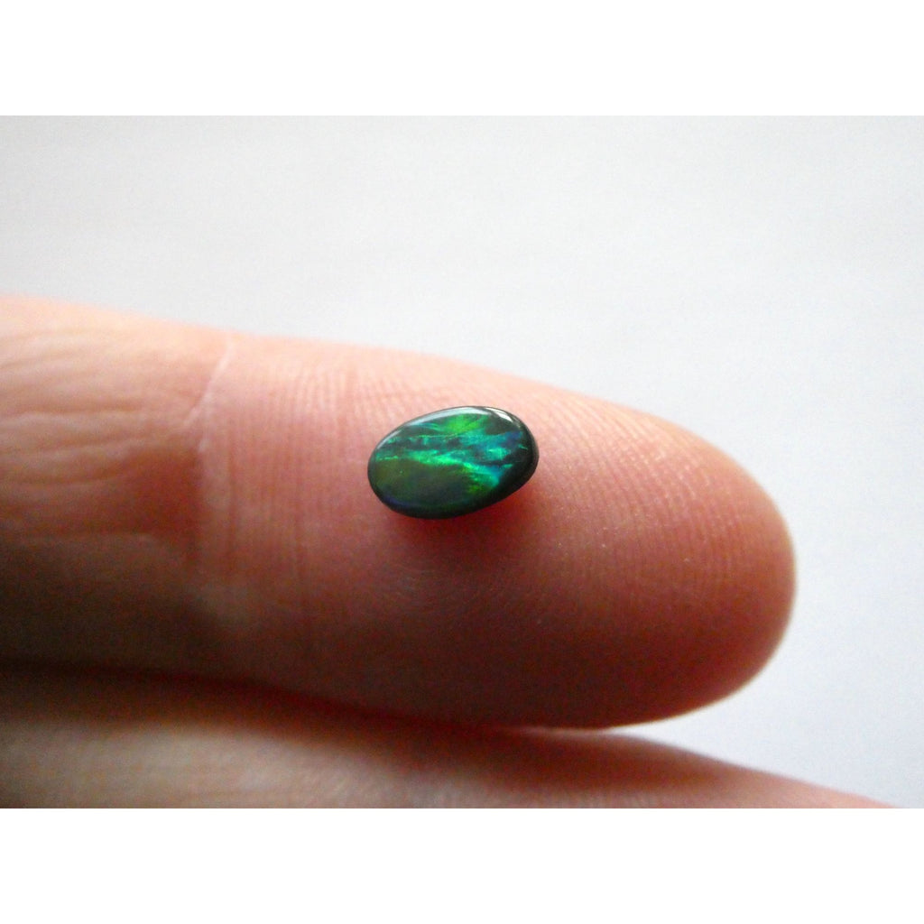 Australian Polished and Cut Freeform Opal Cabochon .42 CT Weight 7.11mm x 4.50mm