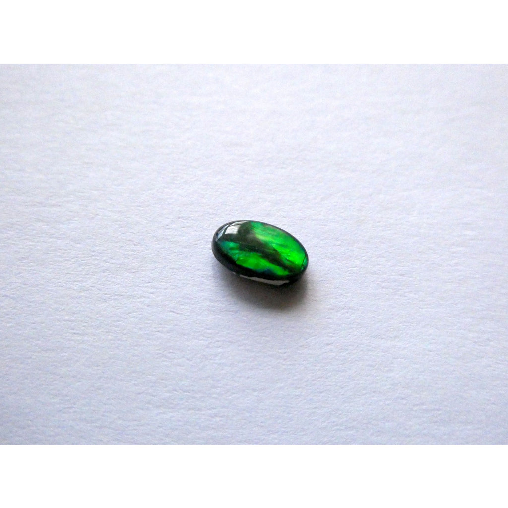 Australian Polished and Cut Freeform Opal Cabochon .42 CT Weight 7.11mm x 4.50mm