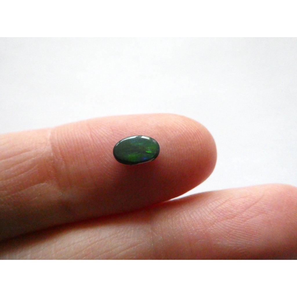 Australian Polished and Cut Freeform Opal Cabochon .42 CT Weight 7.11mm x 4.50mm