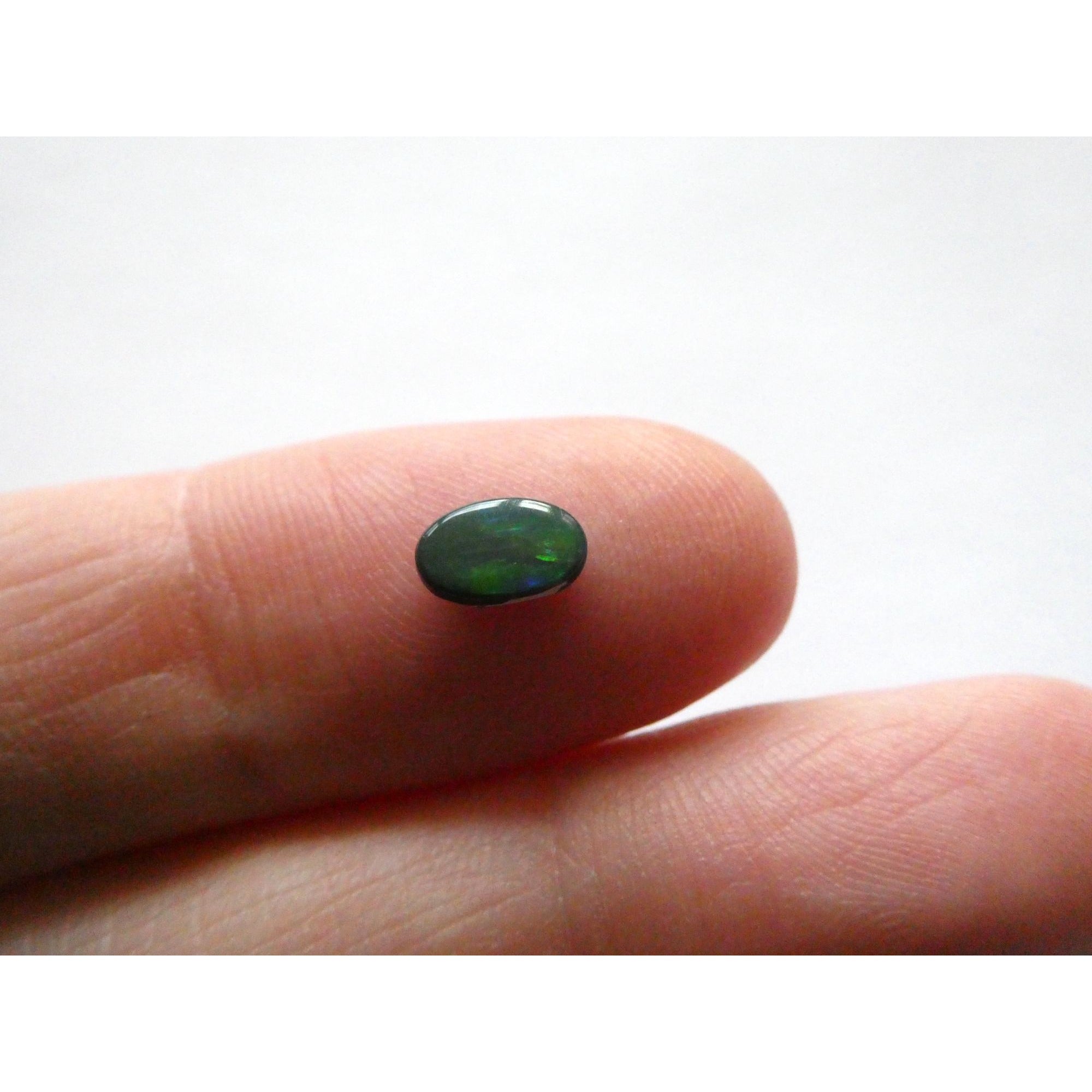 Australian Polished and Cut Freeform Opal Cabochon .42 CT Weight 7.11mm x 4.50mm