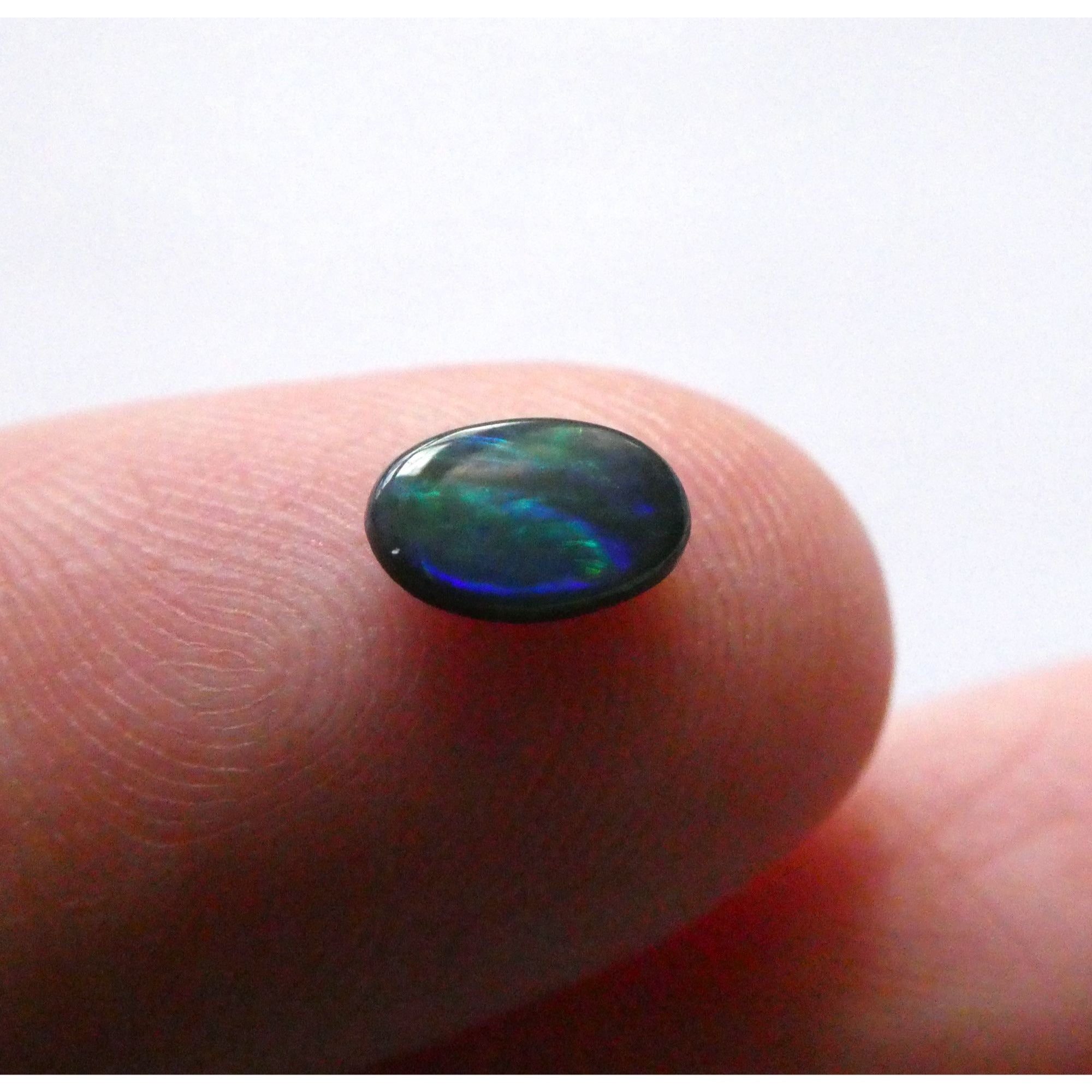 Australian Polished and Cut Freeform Opal Cabochon .42 CT Weight 7.11mm x 4.50mm