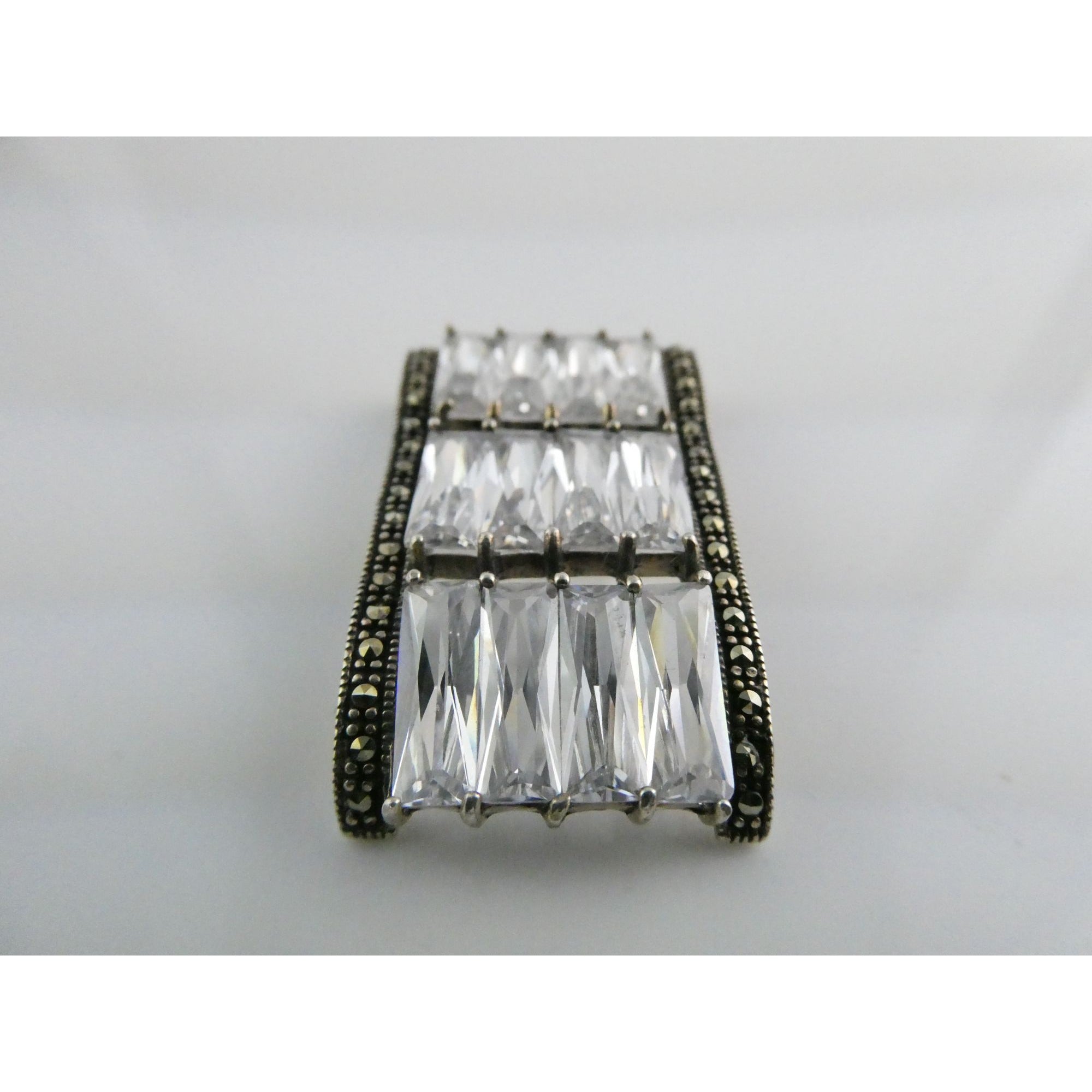 Sterling Silver Twelve White Crystal and Marcasite Lined Rectangular Pendant 925
