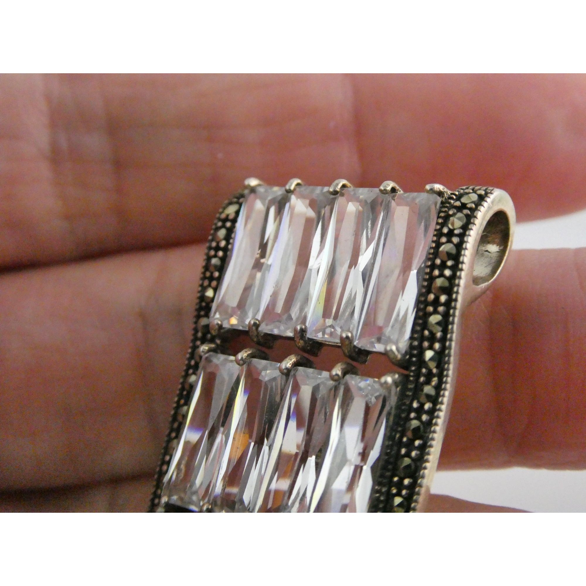 Sterling Silver Twelve White Crystal and Marcasite Lined Rectangular Pendant 925