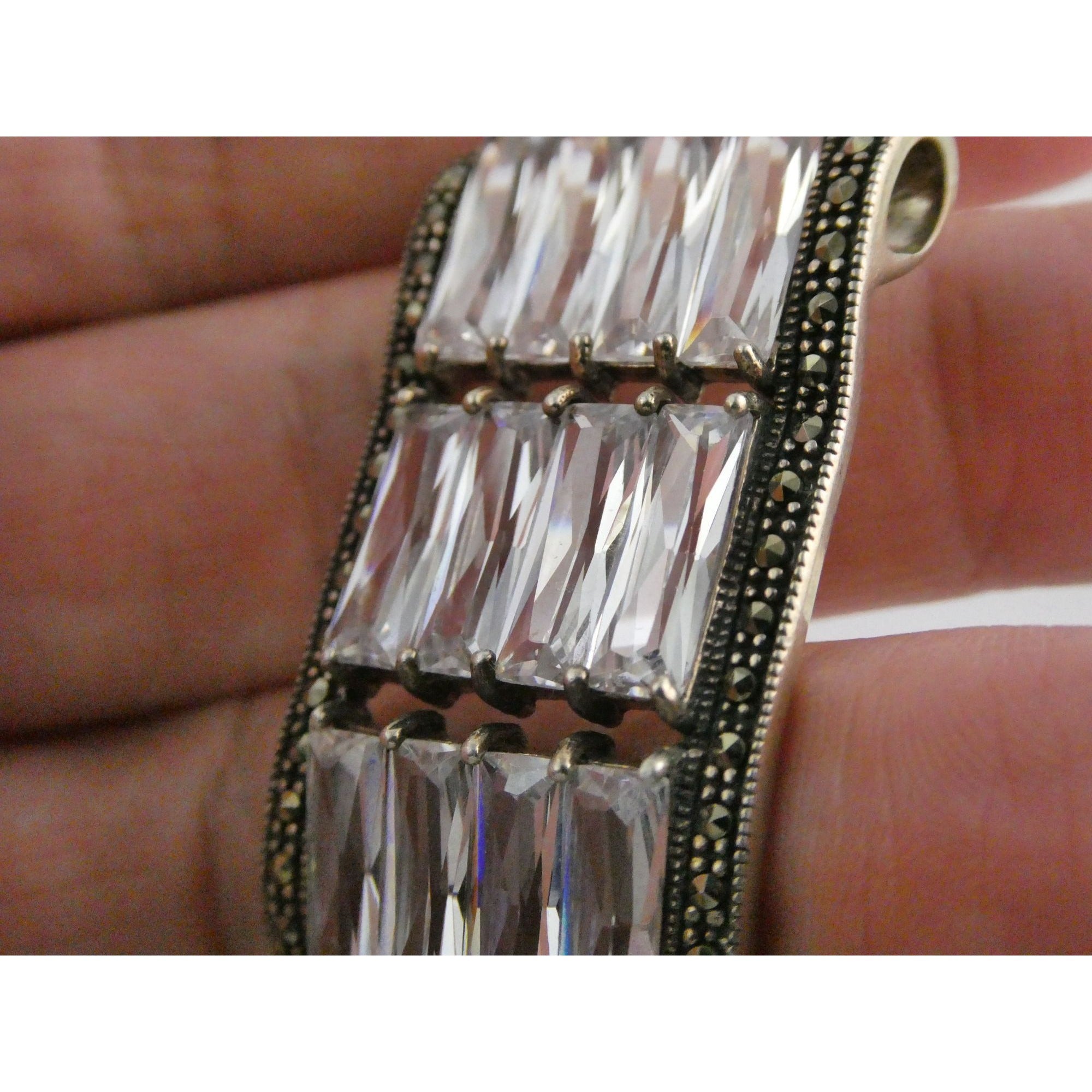 Sterling Silver Twelve White Crystal and Marcasite Lined Rectangular Pendant 925