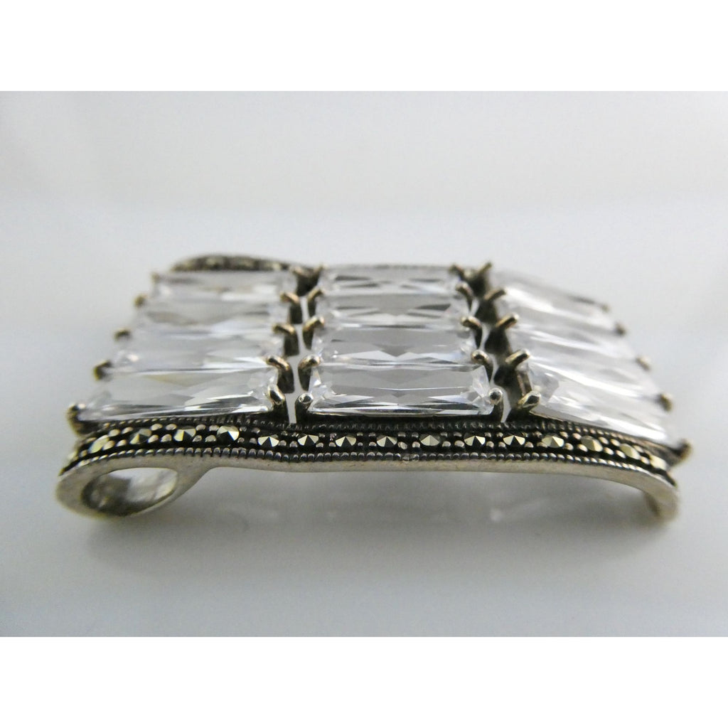 Sterling Silver Twelve White Crystal and Marcasite Lined Rectangular Pendant 925