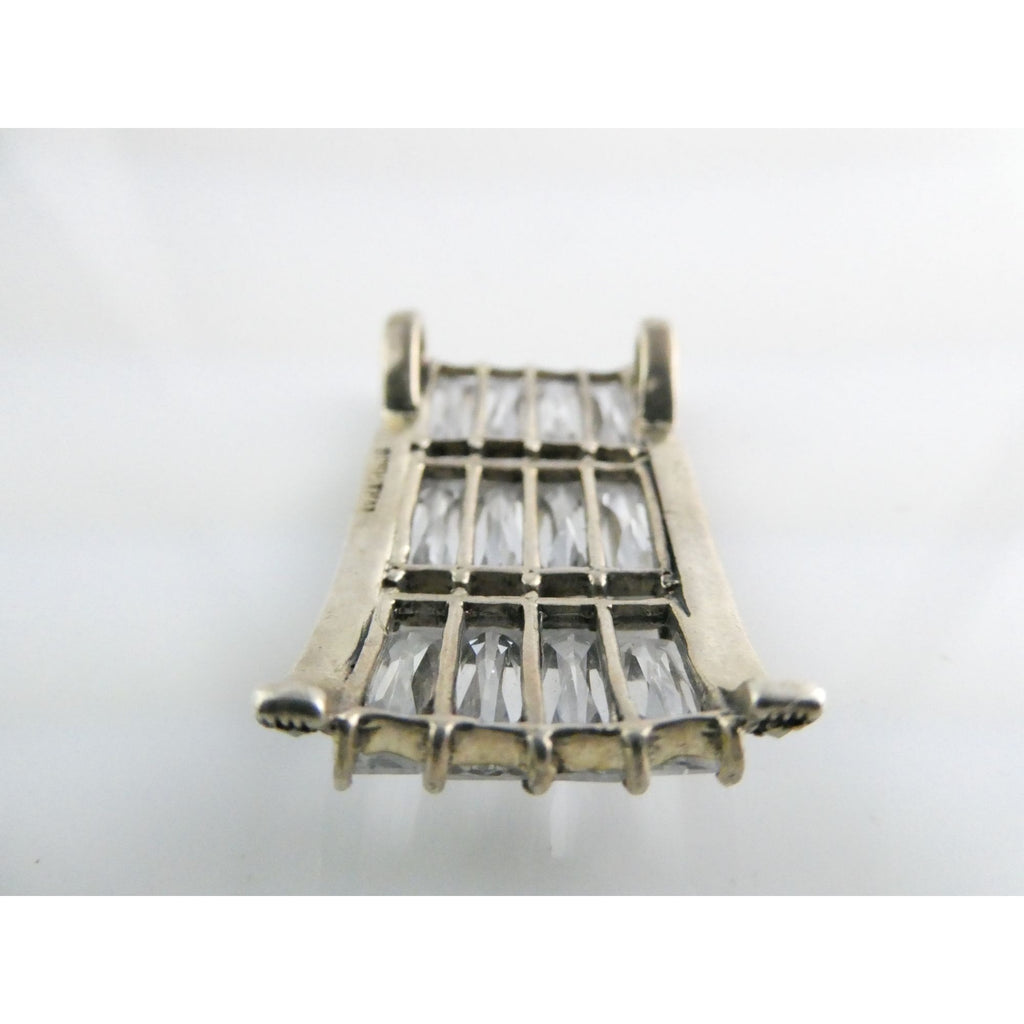 Sterling Silver Twelve White Crystal and Marcasite Lined Rectangular Pendant 925