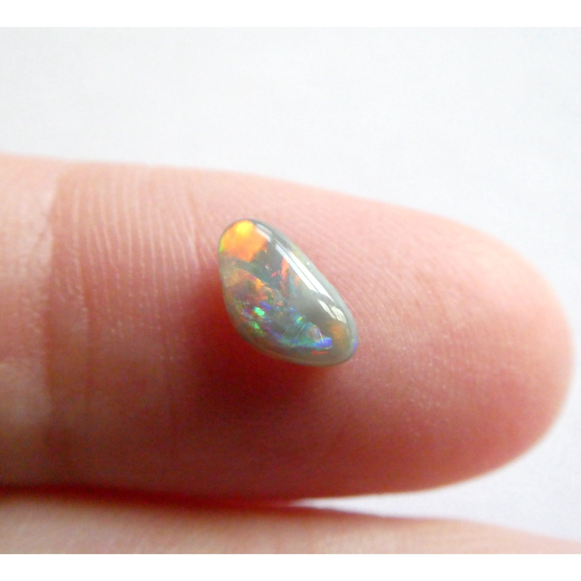 Australian Polished and Cut Freeform Opal Cabochon .60 CT Weight 8.32mm x 4.66mm