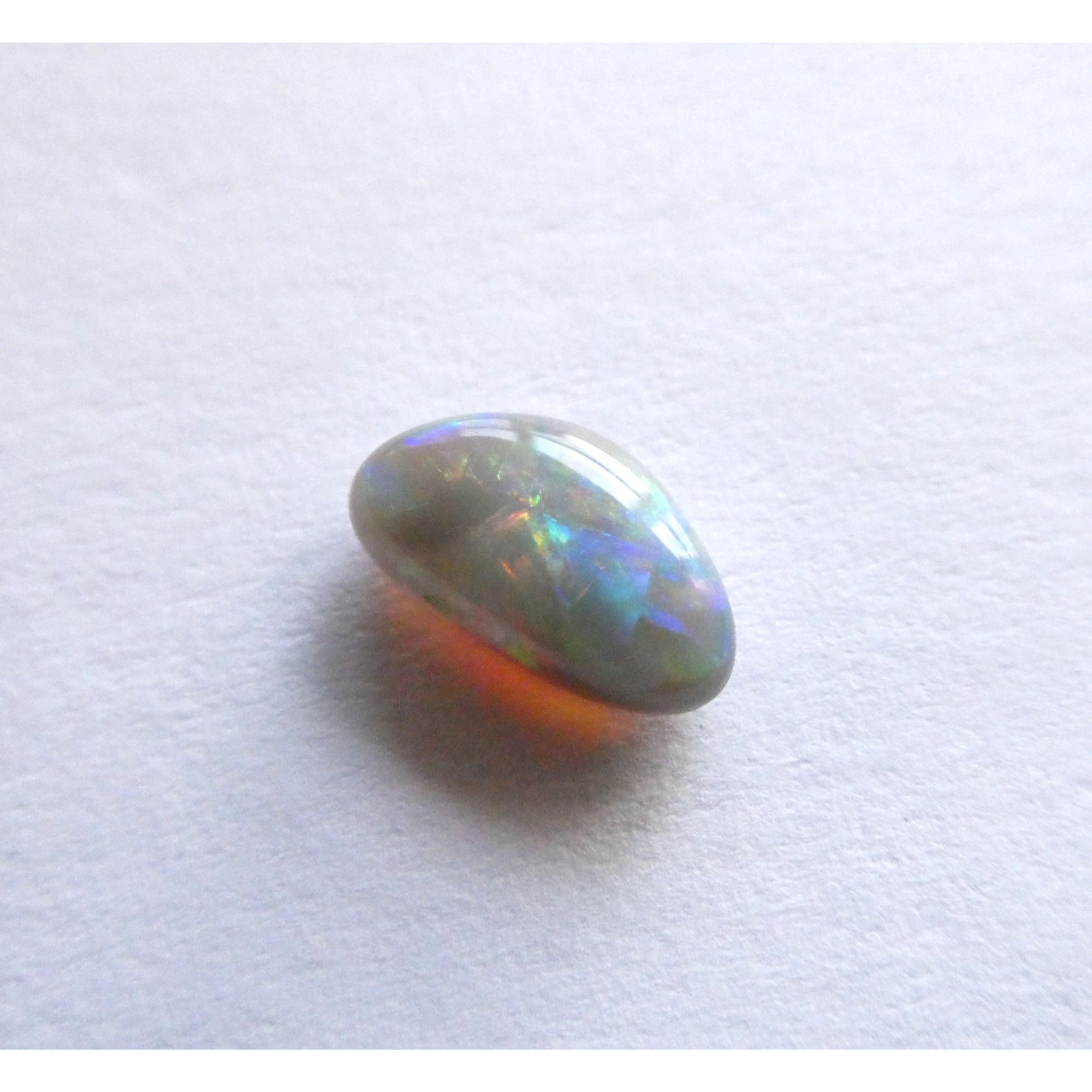 Australian Polished and Cut Freeform Opal Cabochon .60 CT Weight 8.32mm x 4.66mm