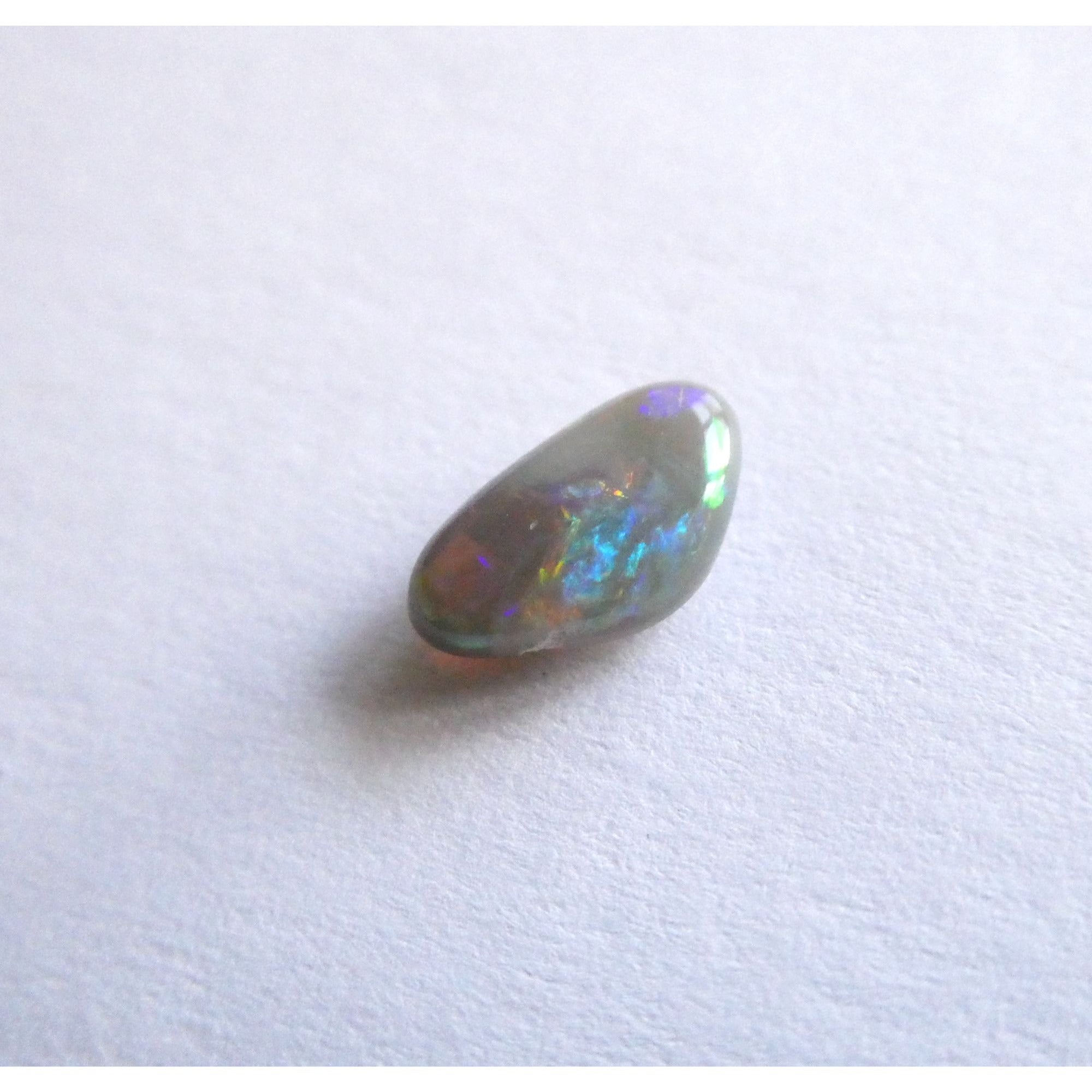 Australian Polished and Cut Freeform Opal Cabochon .60 CT Weight 8.32mm x 4.66mm