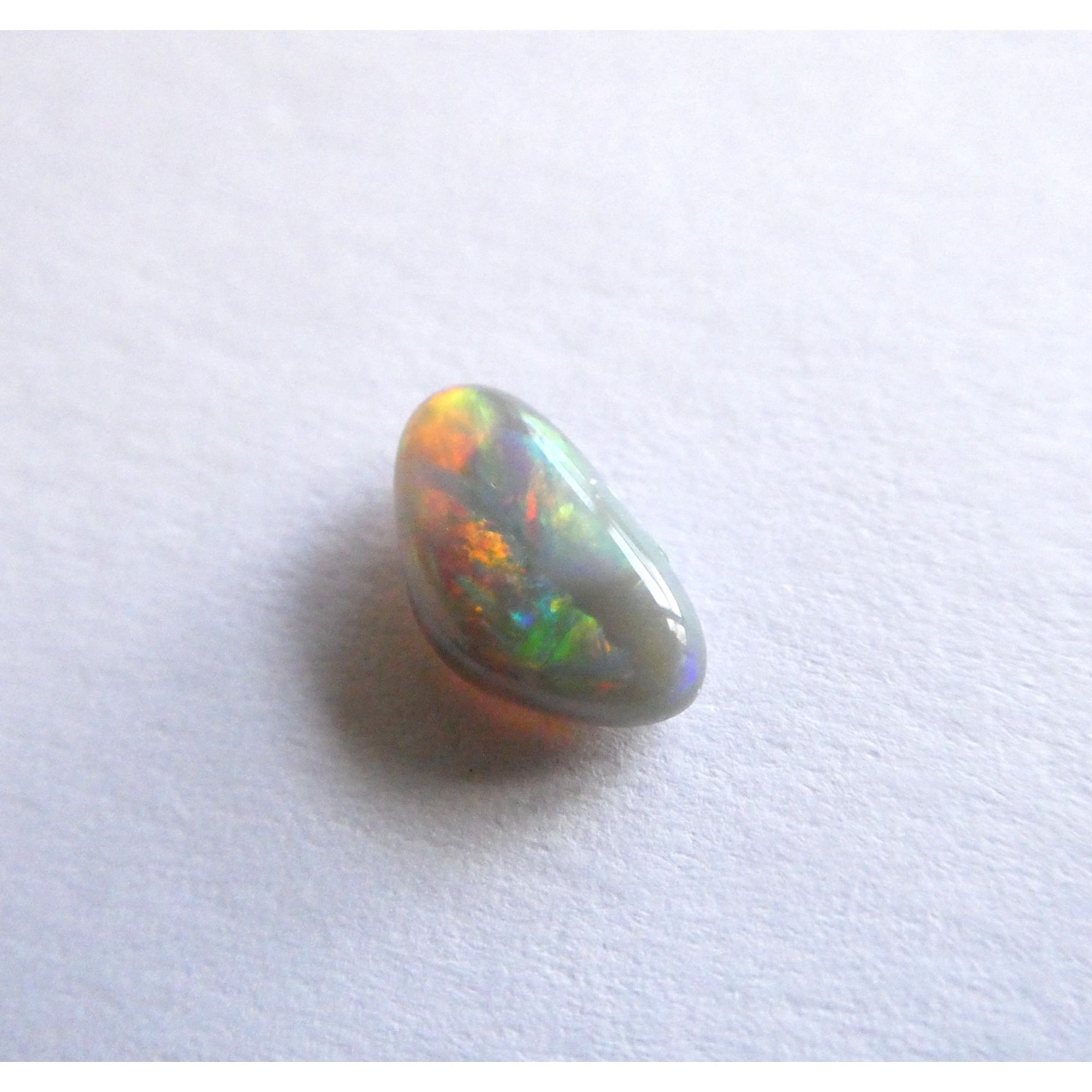Australian Polished and Cut Freeform Opal Cabochon .60 CT Weight 8.32mm x 4.66mm