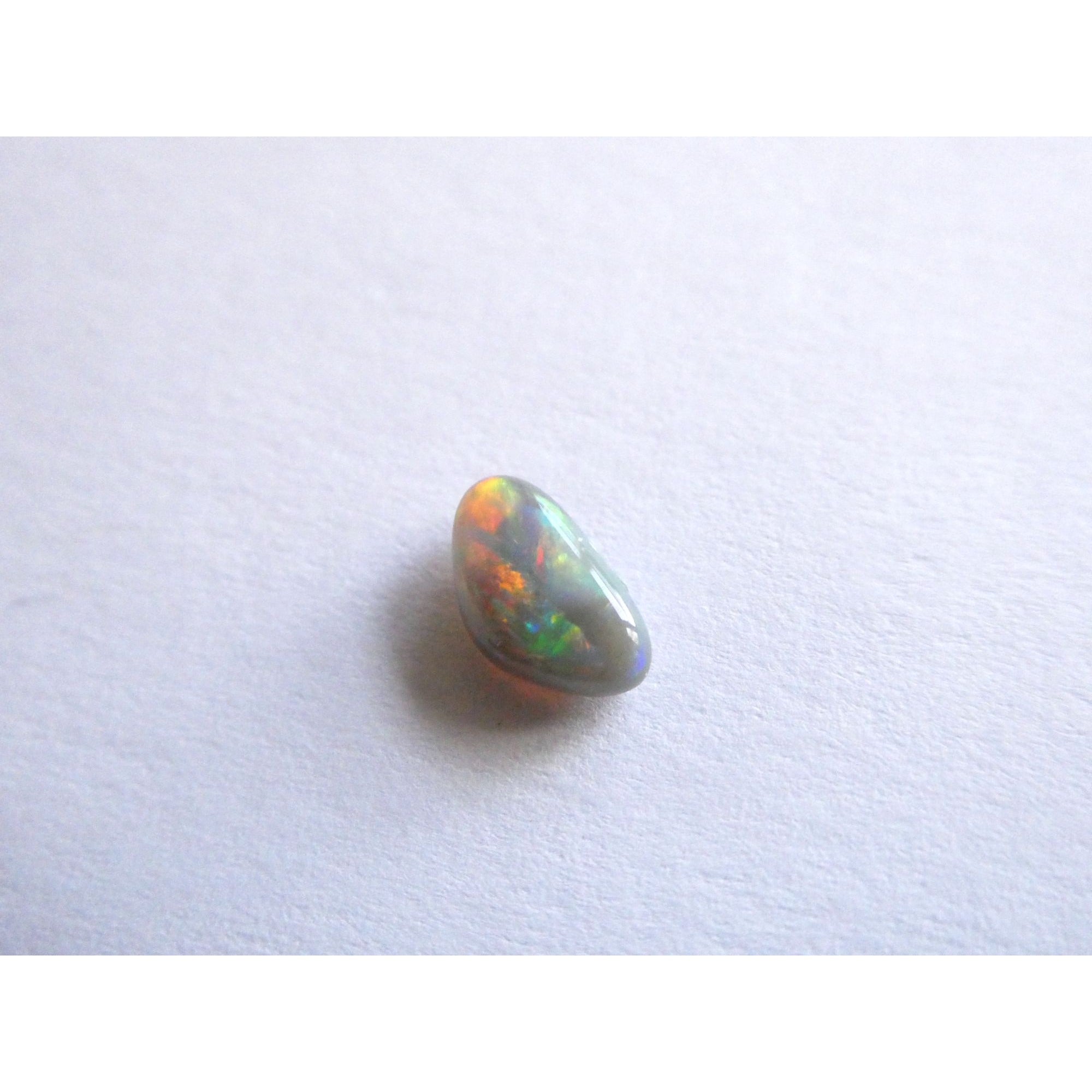 Australian Polished and Cut Freeform Opal Cabochon .60 CT Weight 8.32mm x 4.66mm