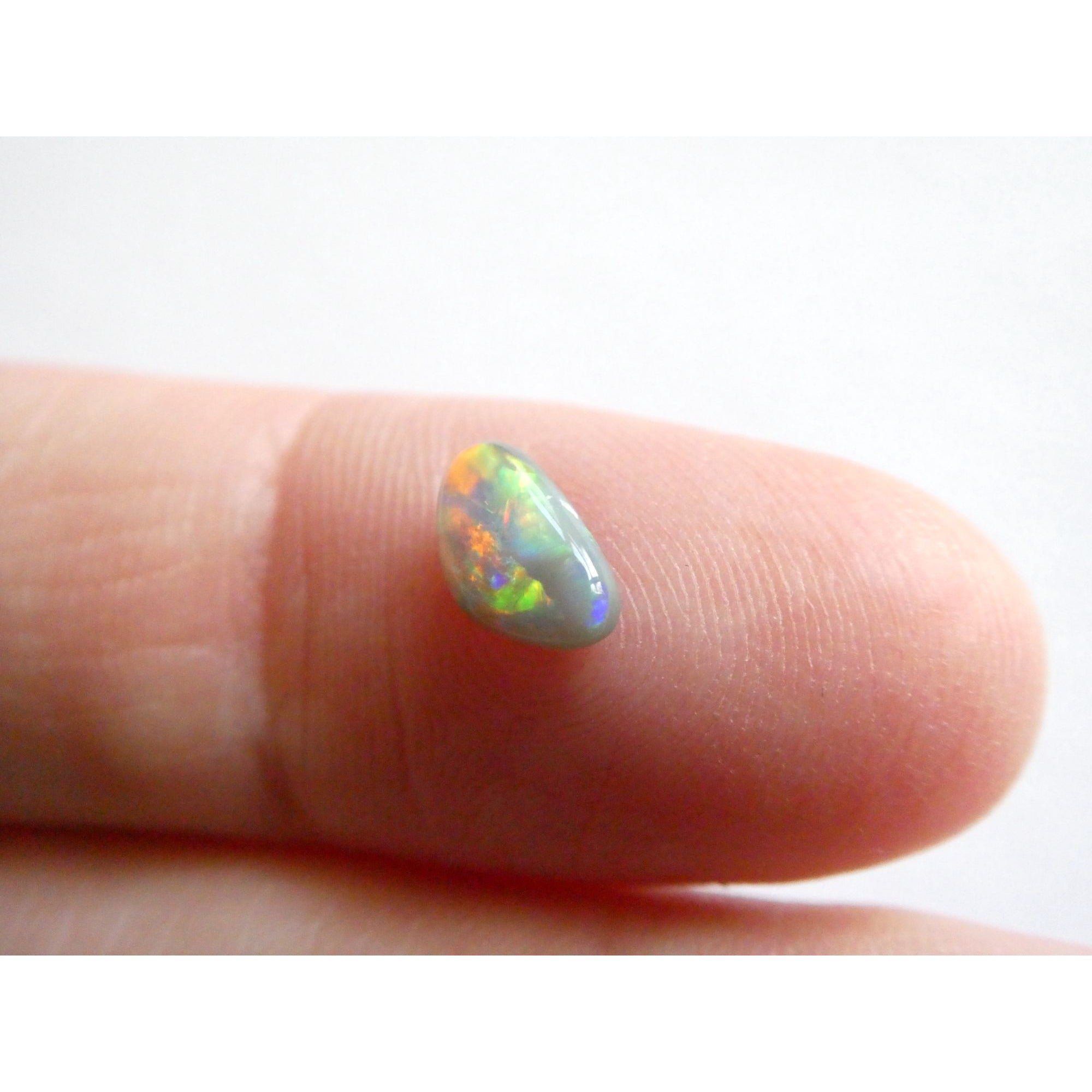Australian Polished and Cut Freeform Opal Cabochon .60 CT Weight 8.32mm x 4.66mm