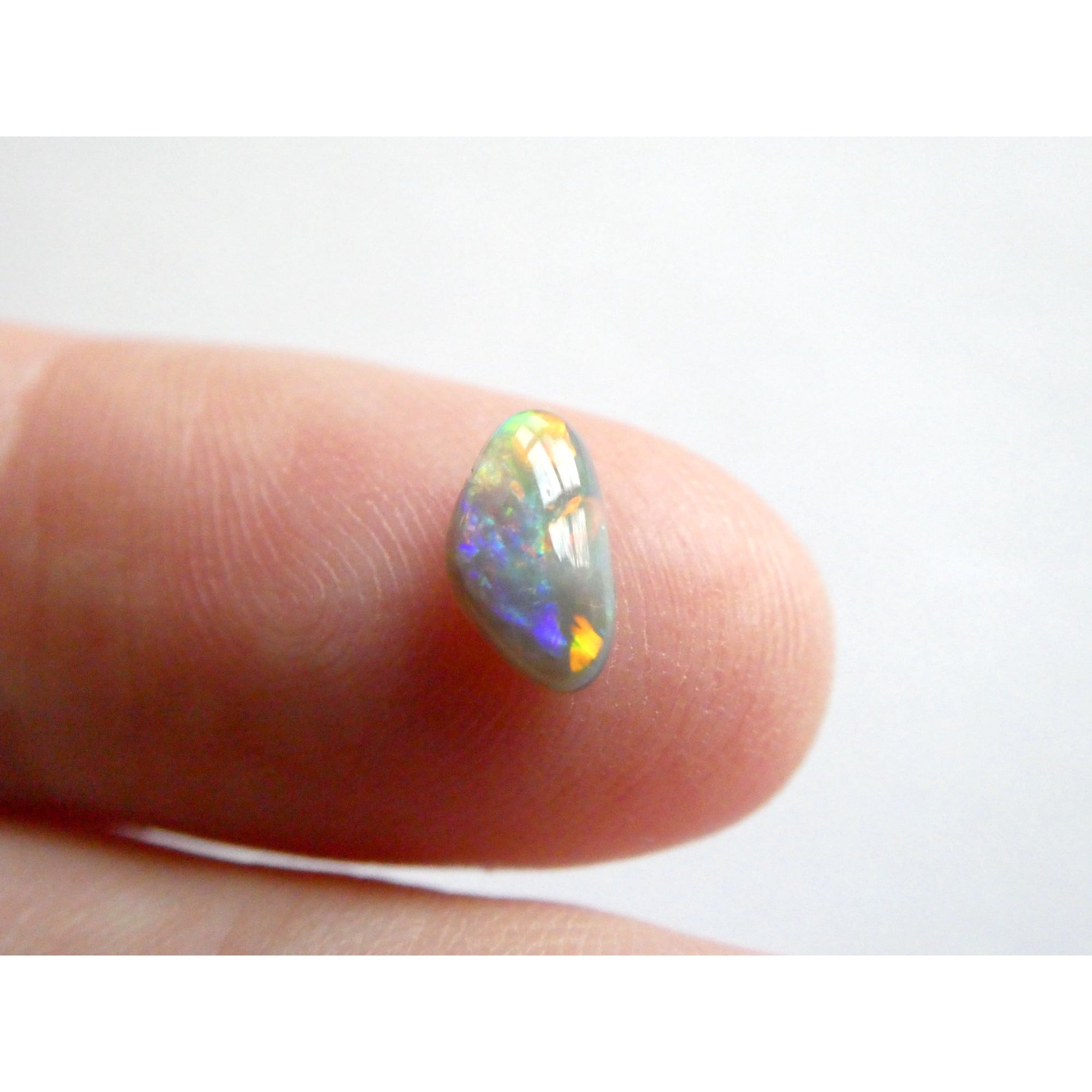 Australian Polished and Cut Freeform Opal Cabochon .60 CT Weight 8.32mm x 4.66mm