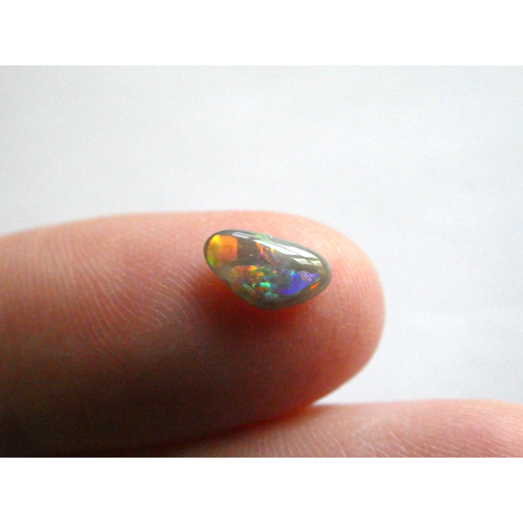 Australian Polished and Cut Freeform Opal Cabochon .60 CT Weight 8.32mm x 4.66mm