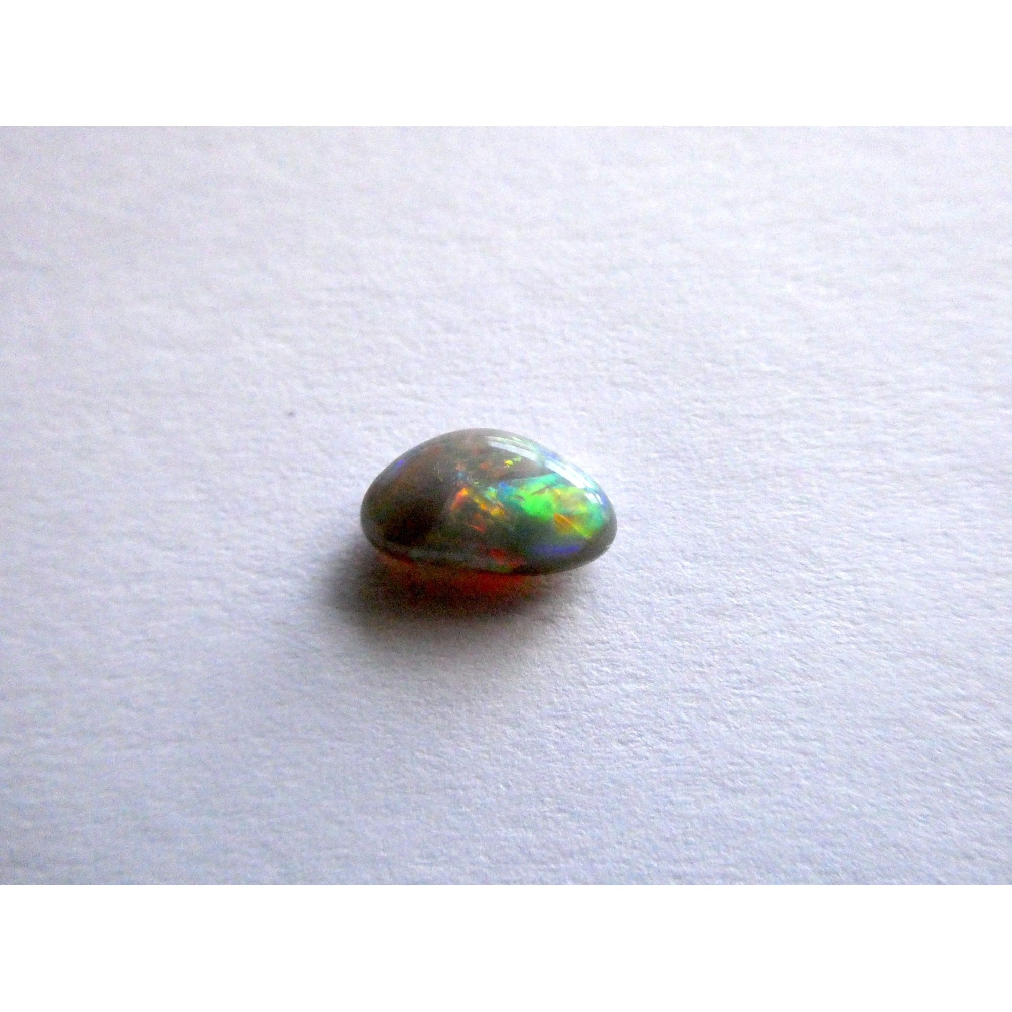 Australian Polished and Cut Freeform Opal Cabochon .60 CT Weight 8.32mm x 4.66mm