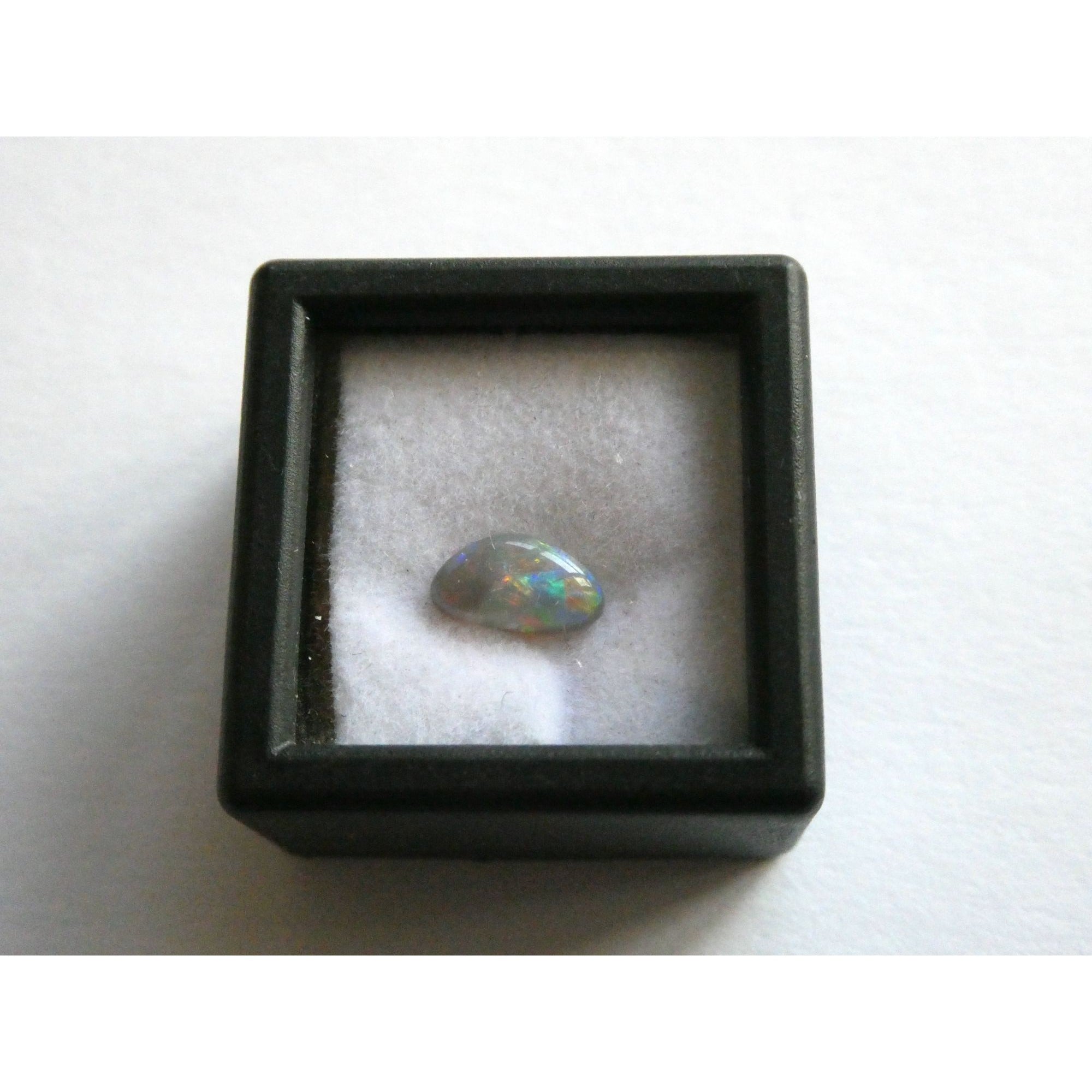 Australian Polished and Cut Freeform Opal Cabochon .60 CT Weight 8.32mm x 4.66mm