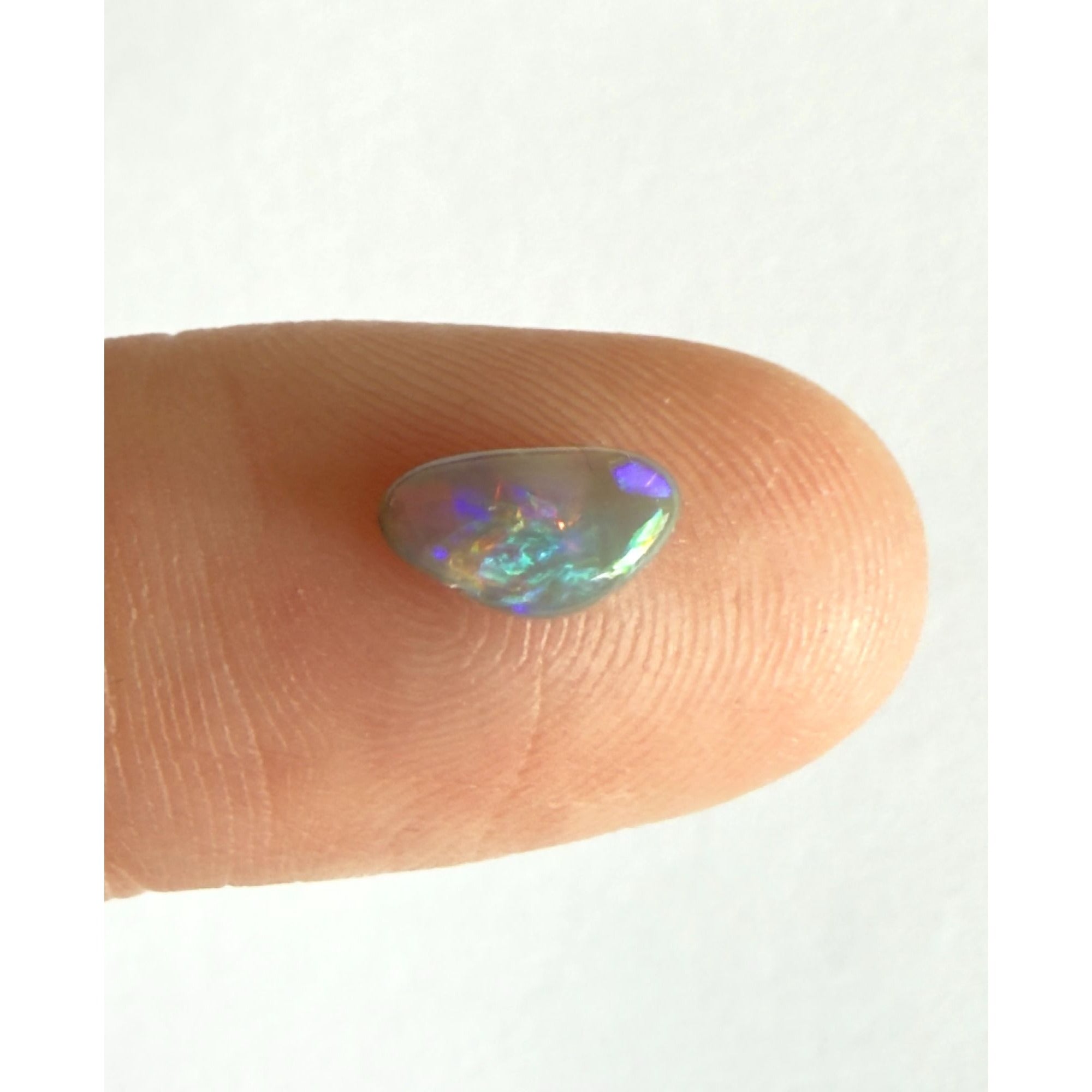 Australian Polished and Cut Freeform Opal Cabochon .60 CT Weight 8.32mm x 4.66mm