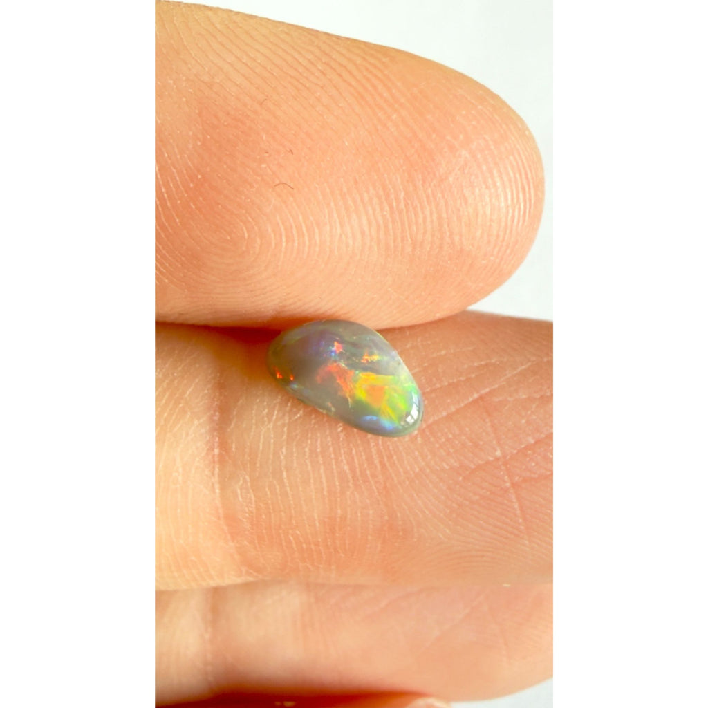 Australian Polished and Cut Freeform Opal Cabochon .60 CT Weight 8.32mm x 4.66mm