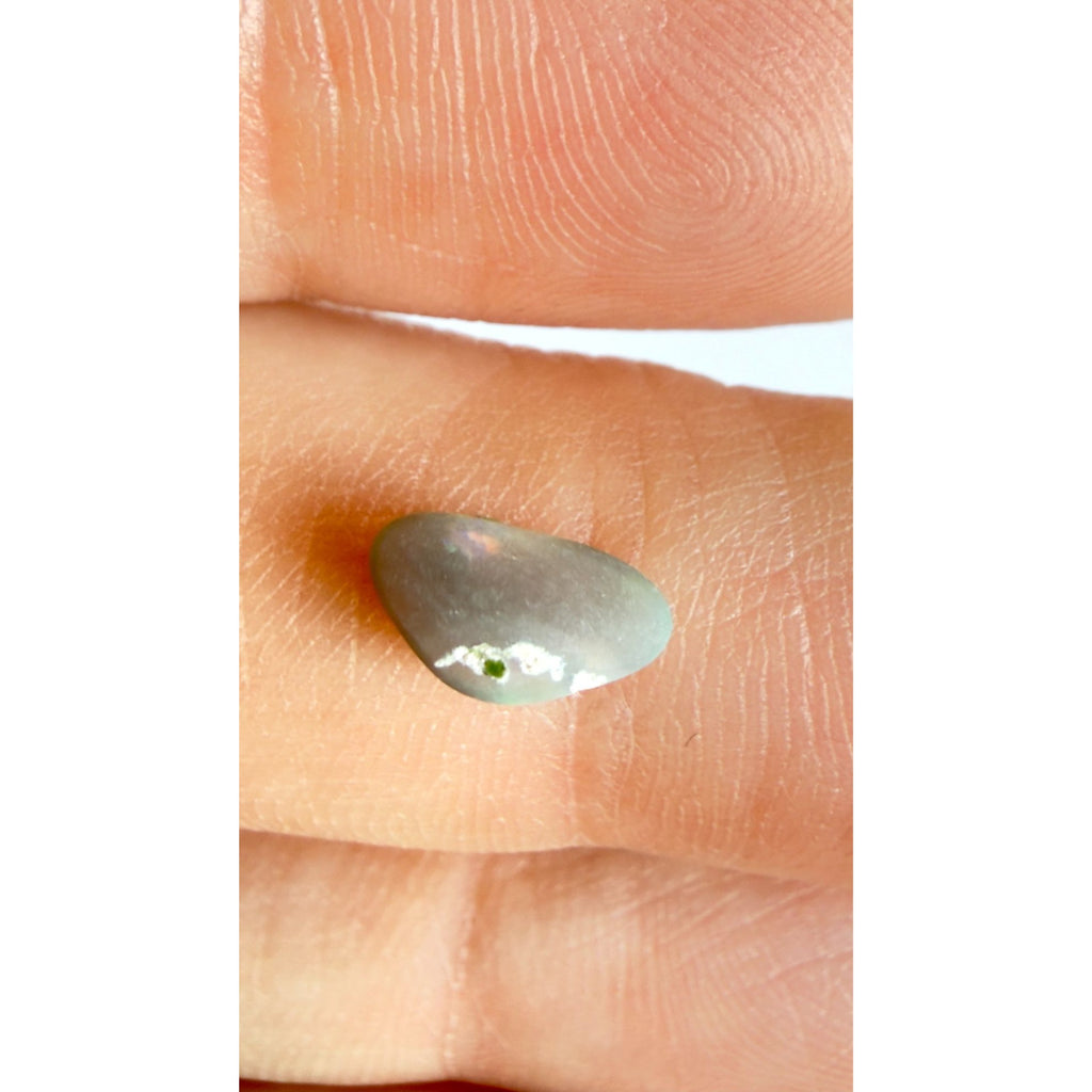 Australian Polished and Cut Freeform Opal Cabochon .60 CT Weight 8.32mm x 4.66mm