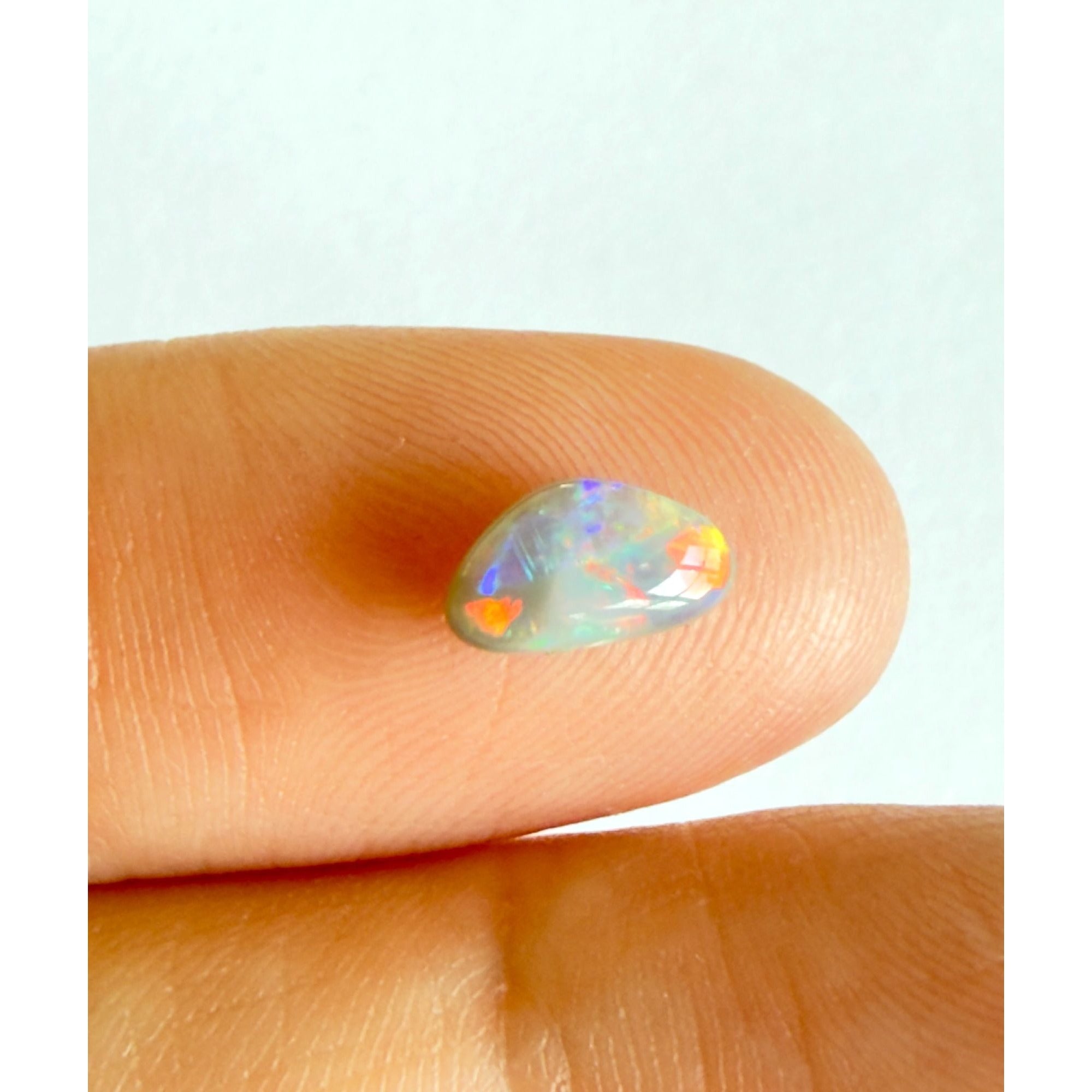 Australian Polished and Cut Freeform Opal Cabochon .60 CT Weight 8.32mm x 4.66mm