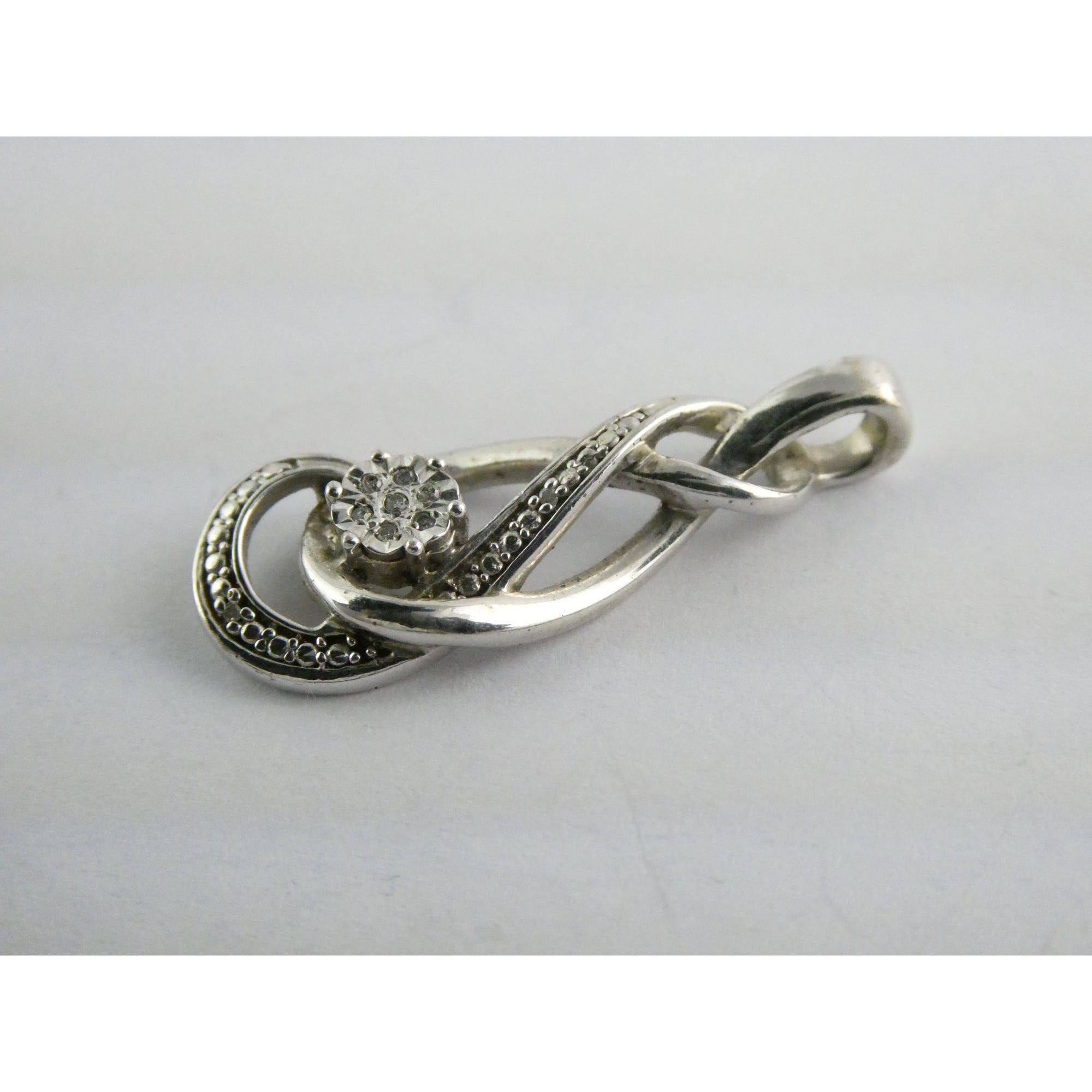 Sterling Silver Natural Diamond Accent Looped Design Pendant 2.7g 925 1 1/8 Inch