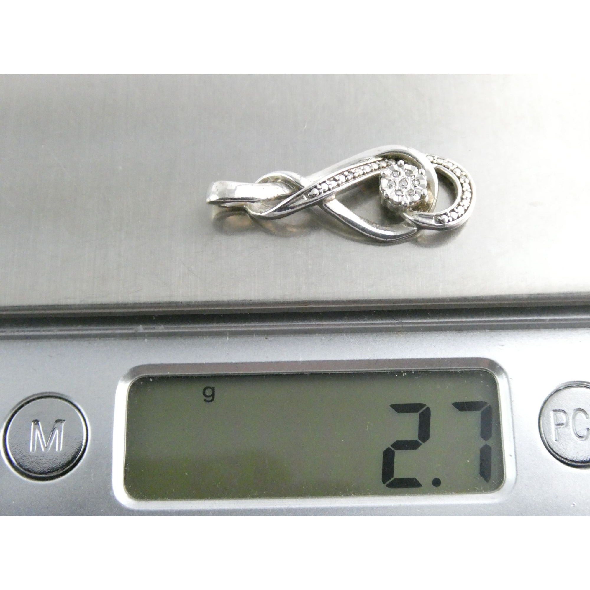 Sterling Silver Natural Diamond Accent Looped Design Pendant 2.7g 925 1 1/8 Inch