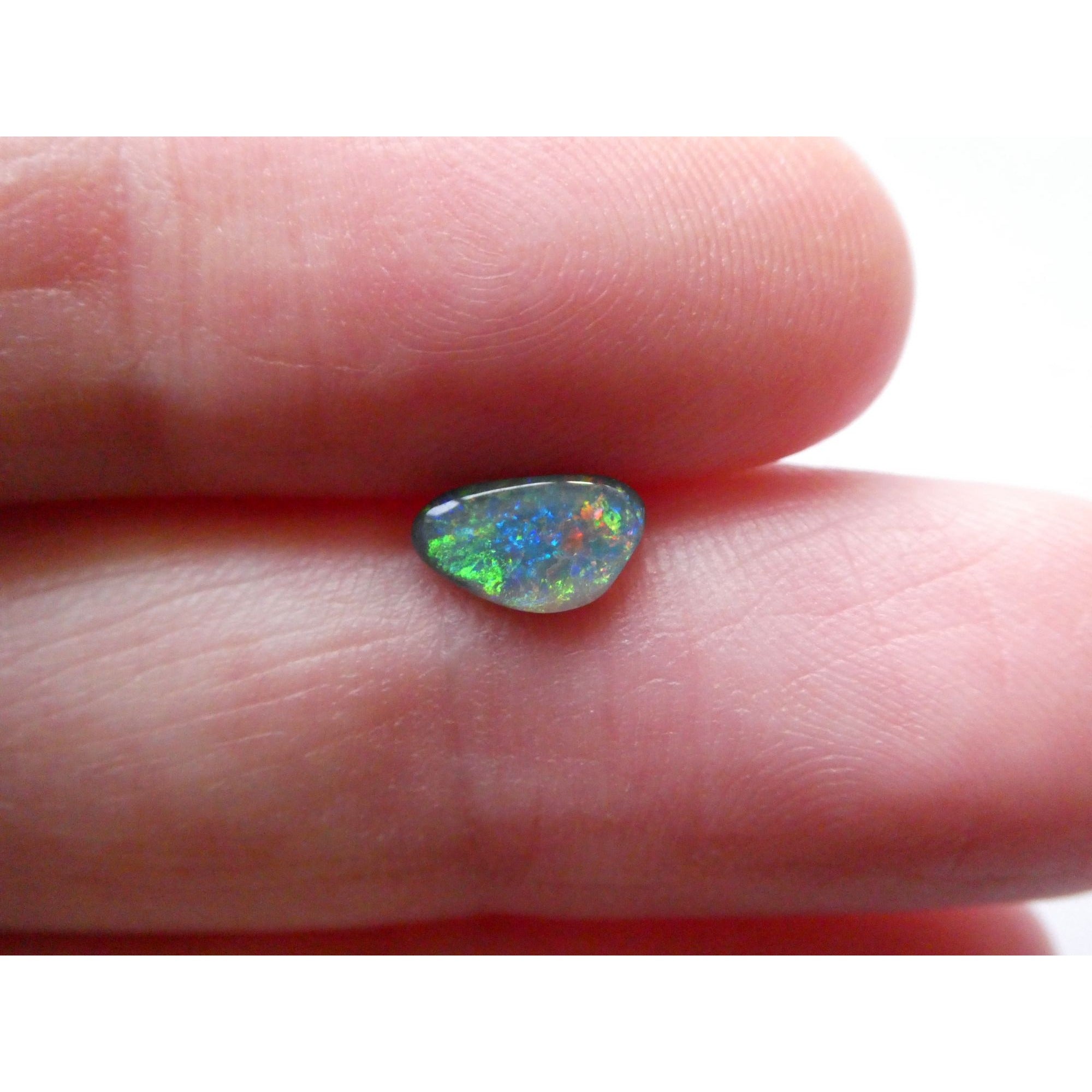 Australian Polished and Cut Freeform Opal Cabochon .40 CT Weight 7.88mm x 4.72mm