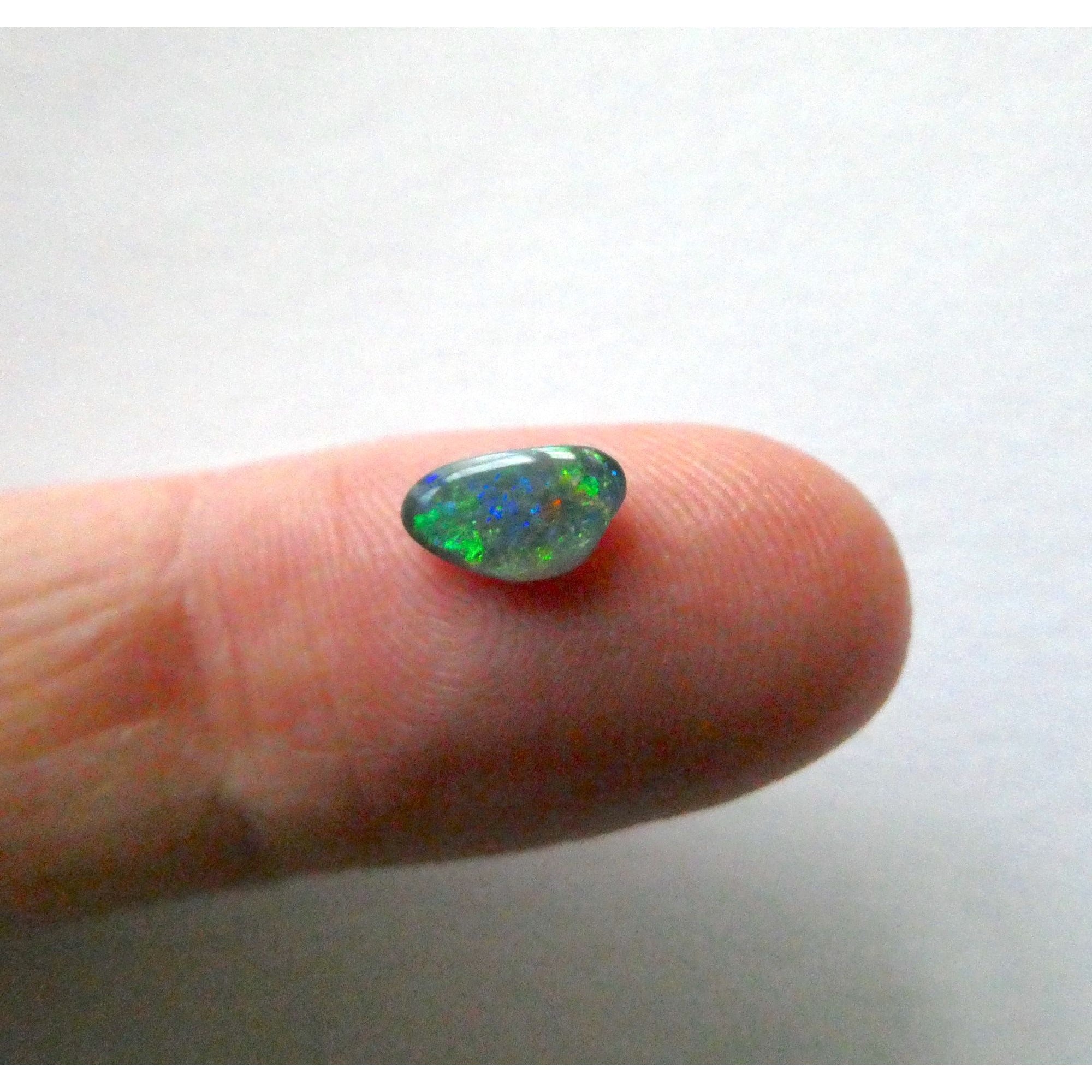 Australian Polished and Cut Freeform Opal Cabochon .40 CT Weight 7.88mm x 4.72mm