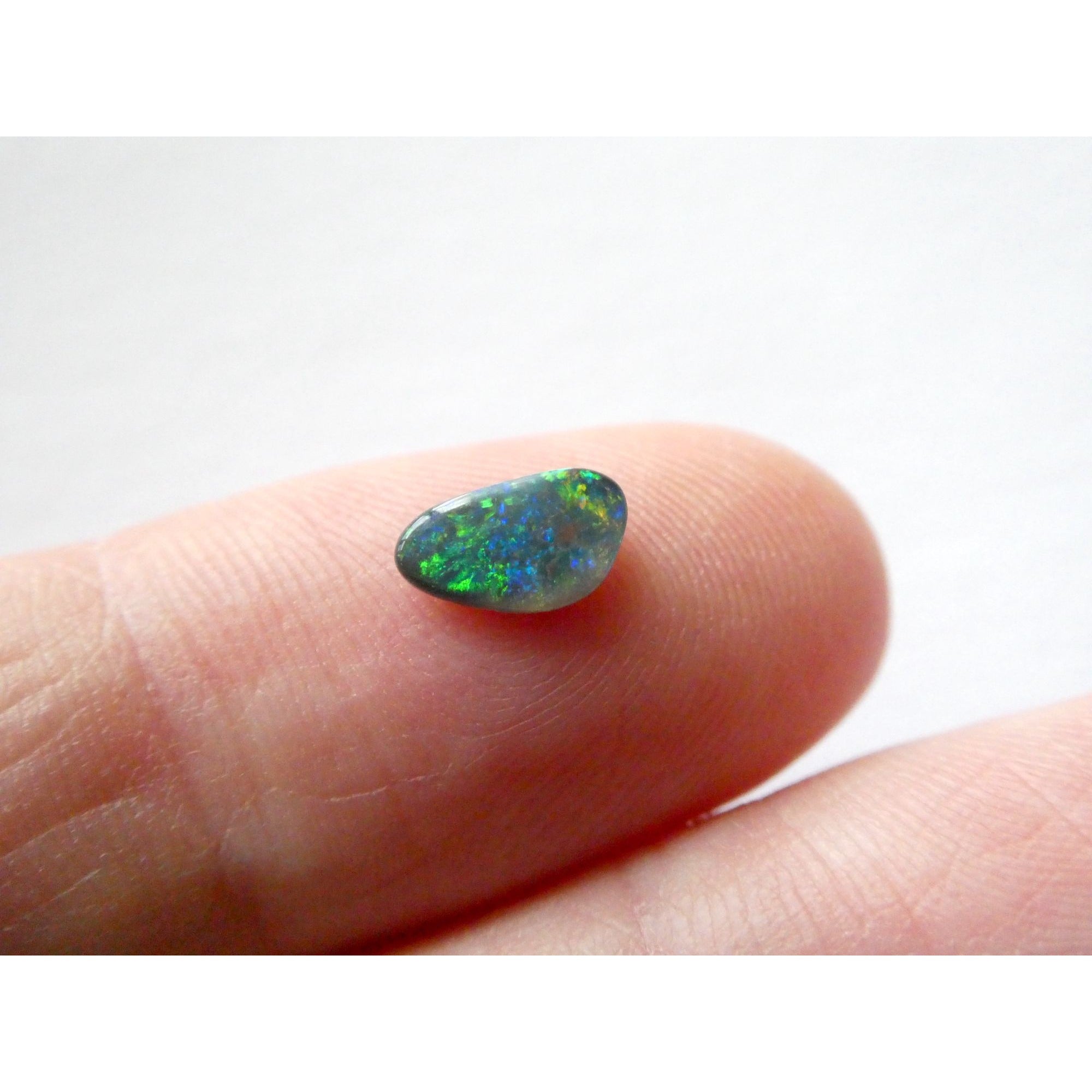 Australian Polished and Cut Freeform Opal Cabochon .40 CT Weight 7.88mm x 4.72mm