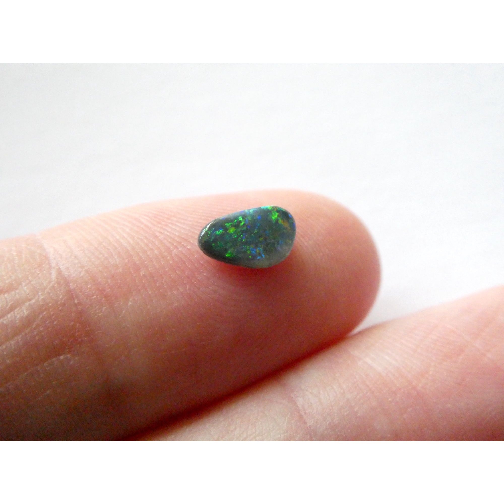 Australian Polished and Cut Freeform Opal Cabochon .40 CT Weight 7.88mm x 4.72mm