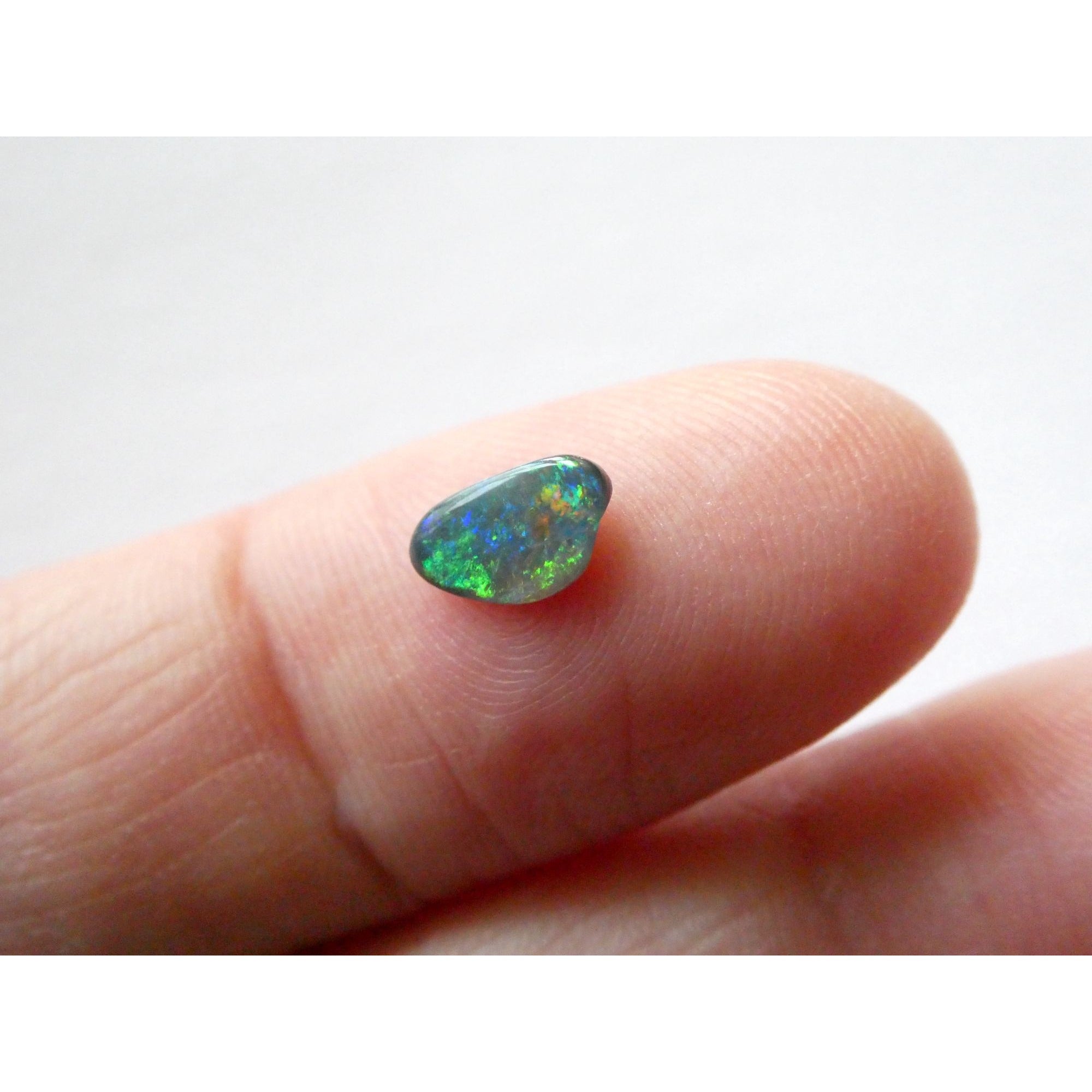 Australian Polished and Cut Freeform Opal Cabochon .40 CT Weight 7.88mm x 4.72mm