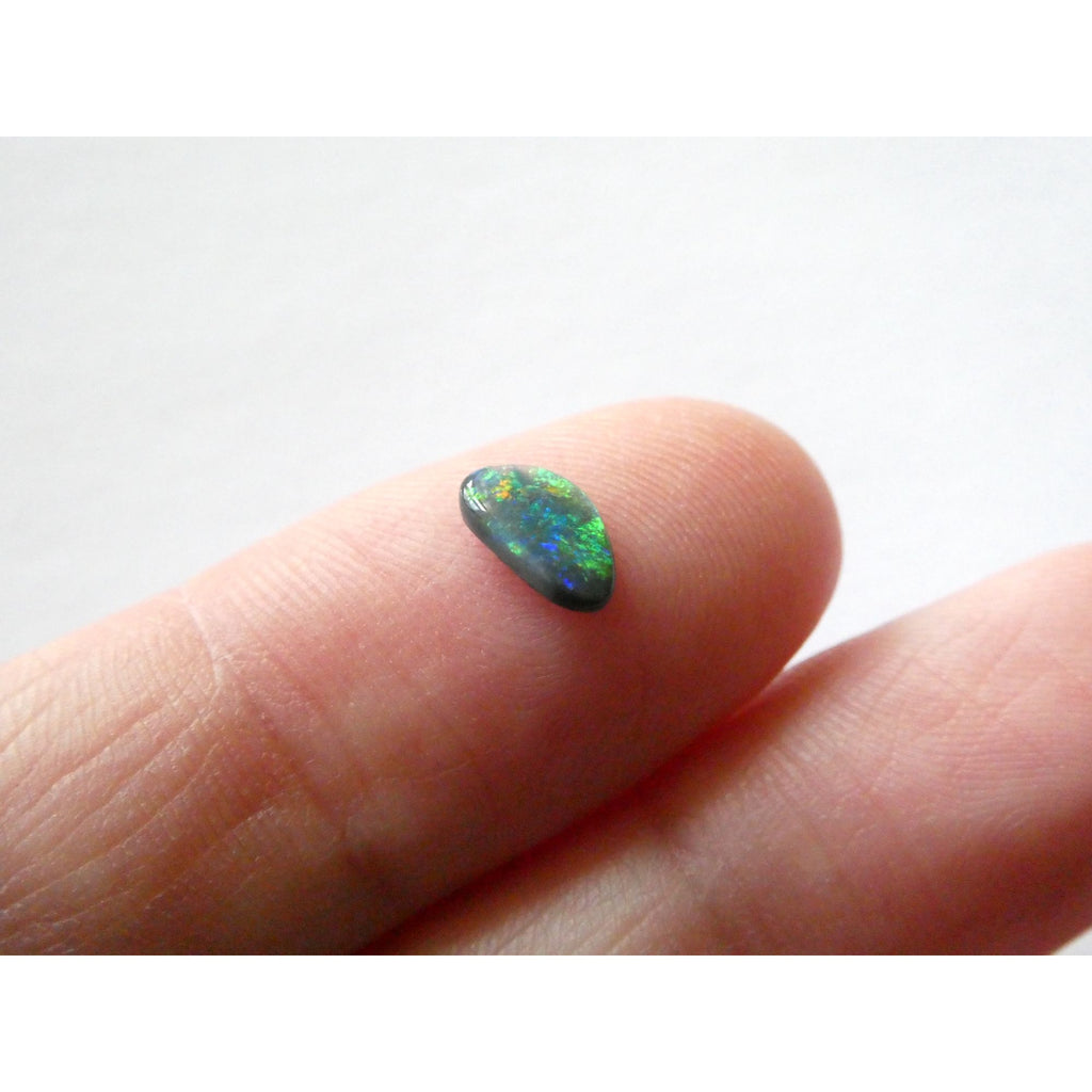 Australian Polished and Cut Freeform Opal Cabochon .40 CT Weight 7.88mm x 4.72mm