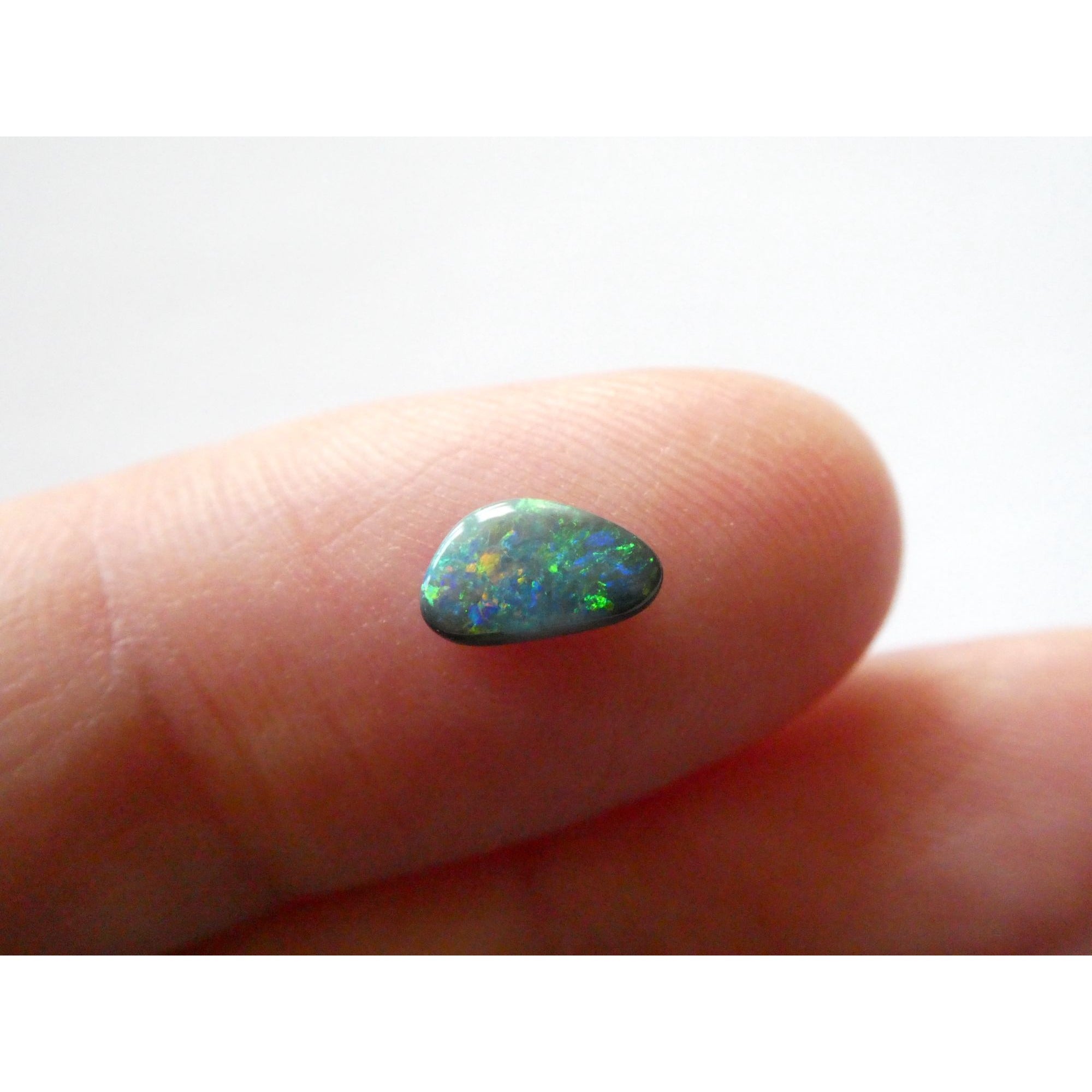 Australian Polished and Cut Freeform Opal Cabochon .40 CT Weight 7.88mm x 4.72mm