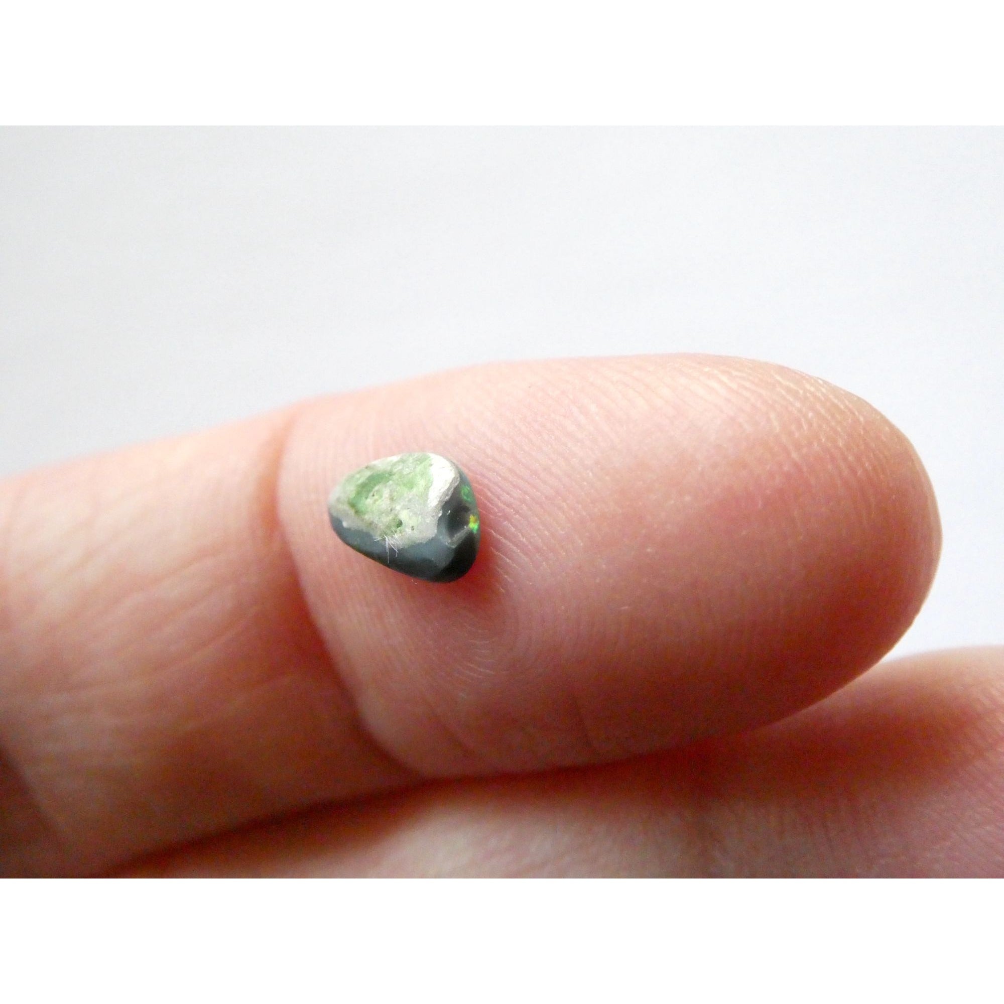 Australian Polished and Cut Freeform Opal Cabochon .40 CT Weight 7.88mm x 4.72mm