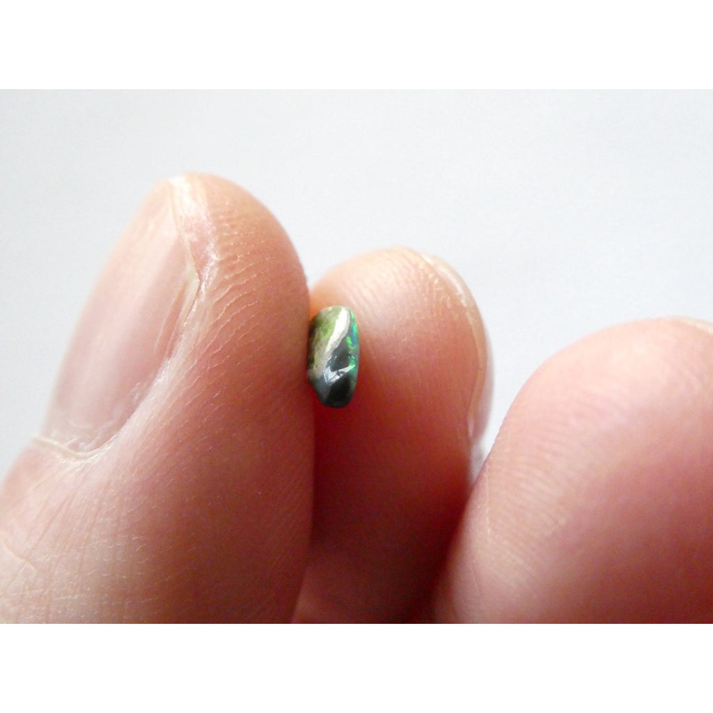 Australian Polished and Cut Freeform Opal Cabochon .40 CT Weight 7.88mm x 4.72mm