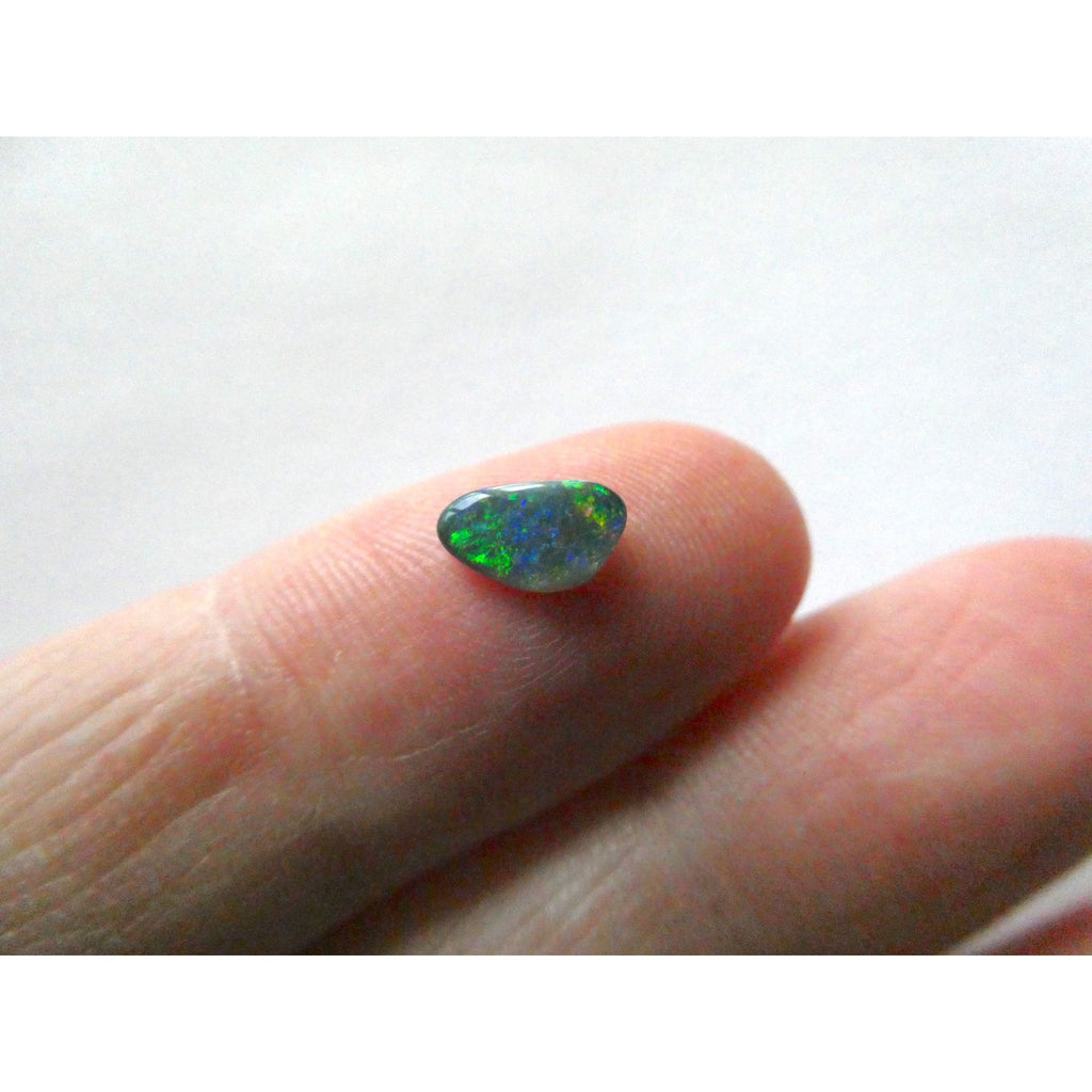 Australian Polished and Cut Freeform Opal Cabochon .40 CT Weight 7.88mm x 4.72mm