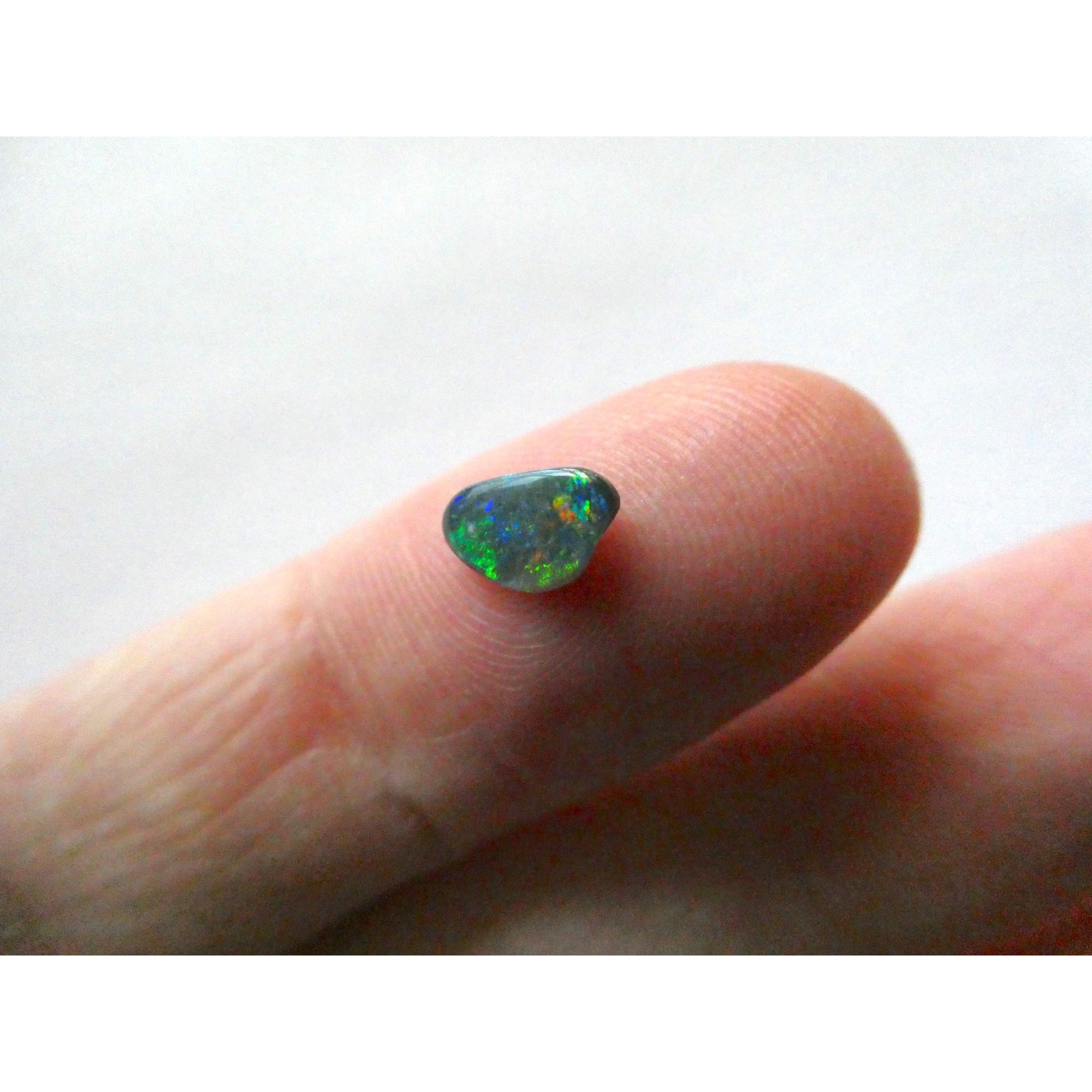 Australian Polished and Cut Freeform Opal Cabochon .40 CT Weight 7.88mm x 4.72mm