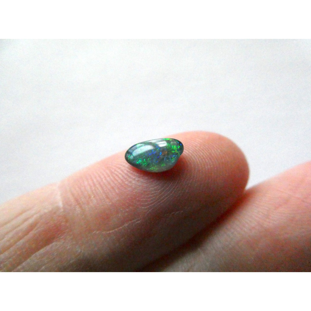 Australian Polished and Cut Freeform Opal Cabochon .40 CT Weight 7.88mm x 4.72mm