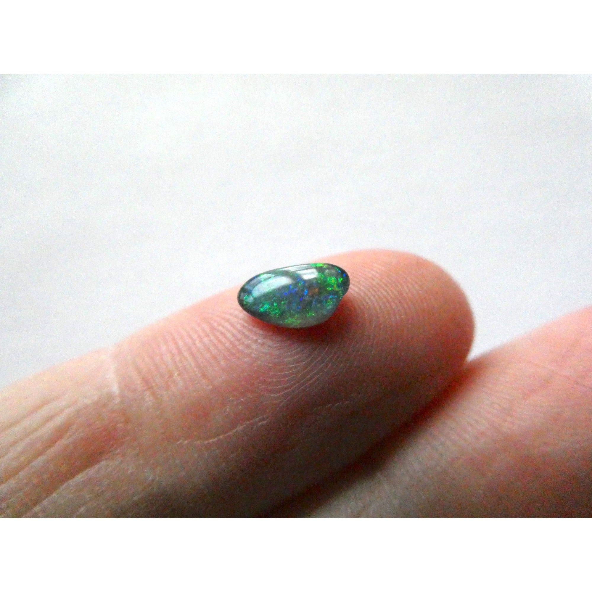 Australian Polished and Cut Freeform Opal Cabochon .40 CT Weight 7.88mm x 4.72mm