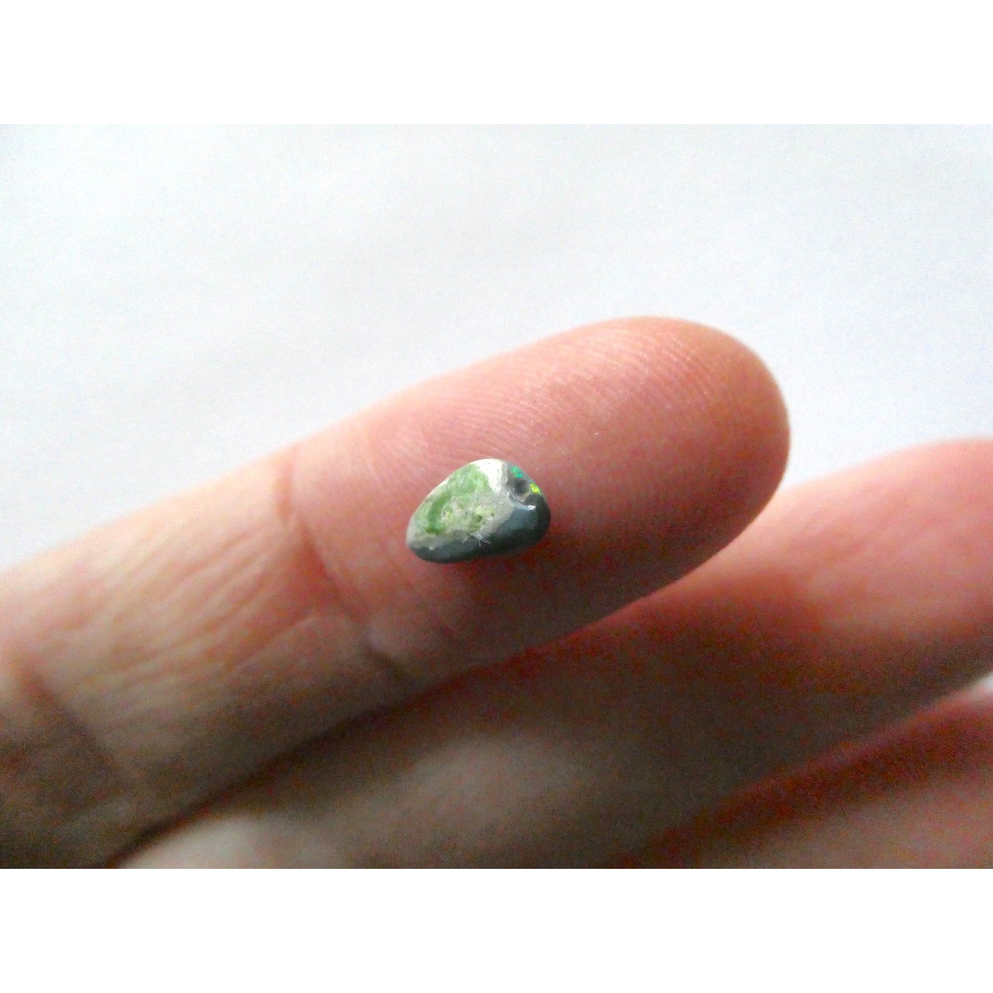 Australian Polished and Cut Freeform Opal Cabochon .40 CT Weight 7.88mm x 4.72mm