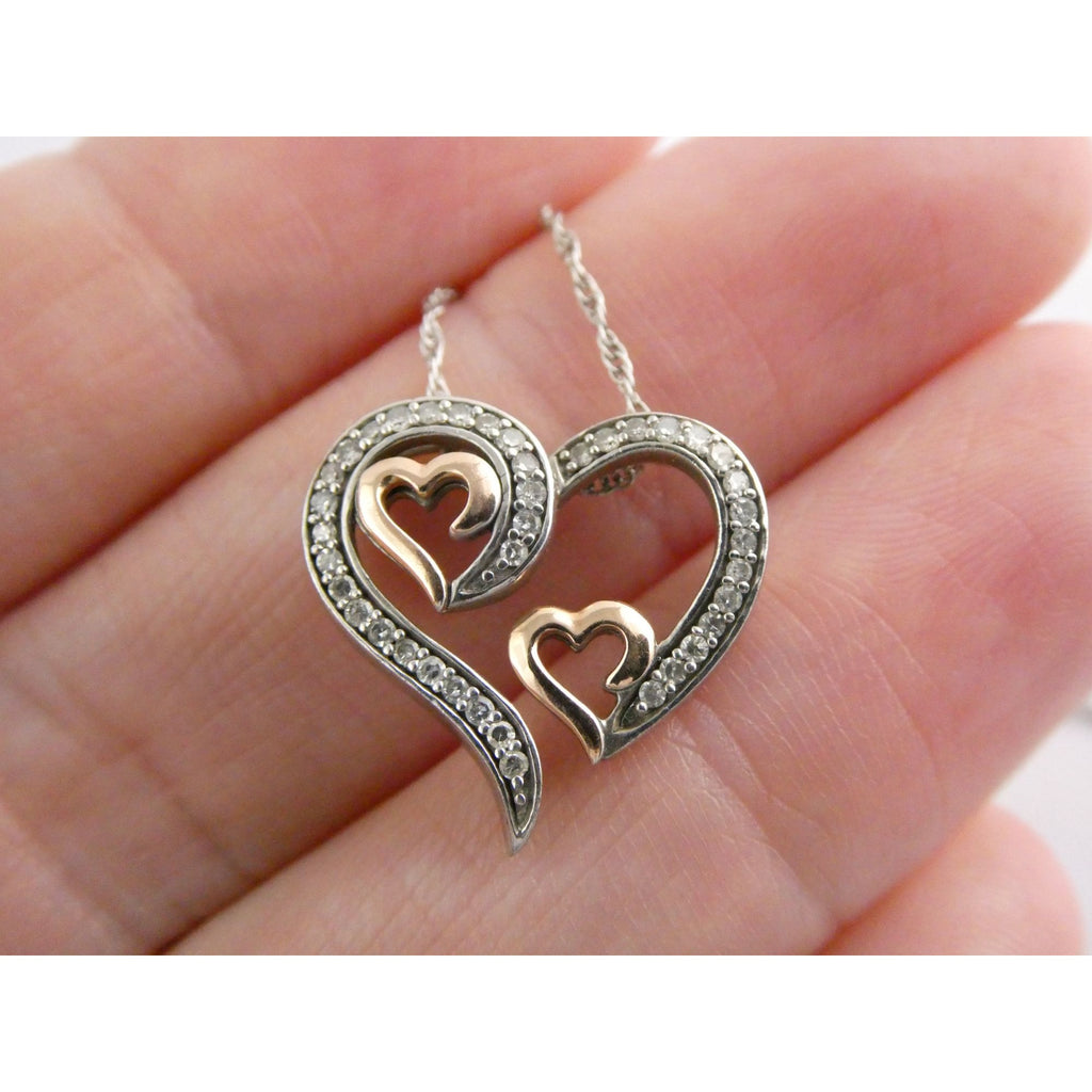 CO Sterling Silver and 10k Gold Natural Diamond Three Hearts Pendant Necklace